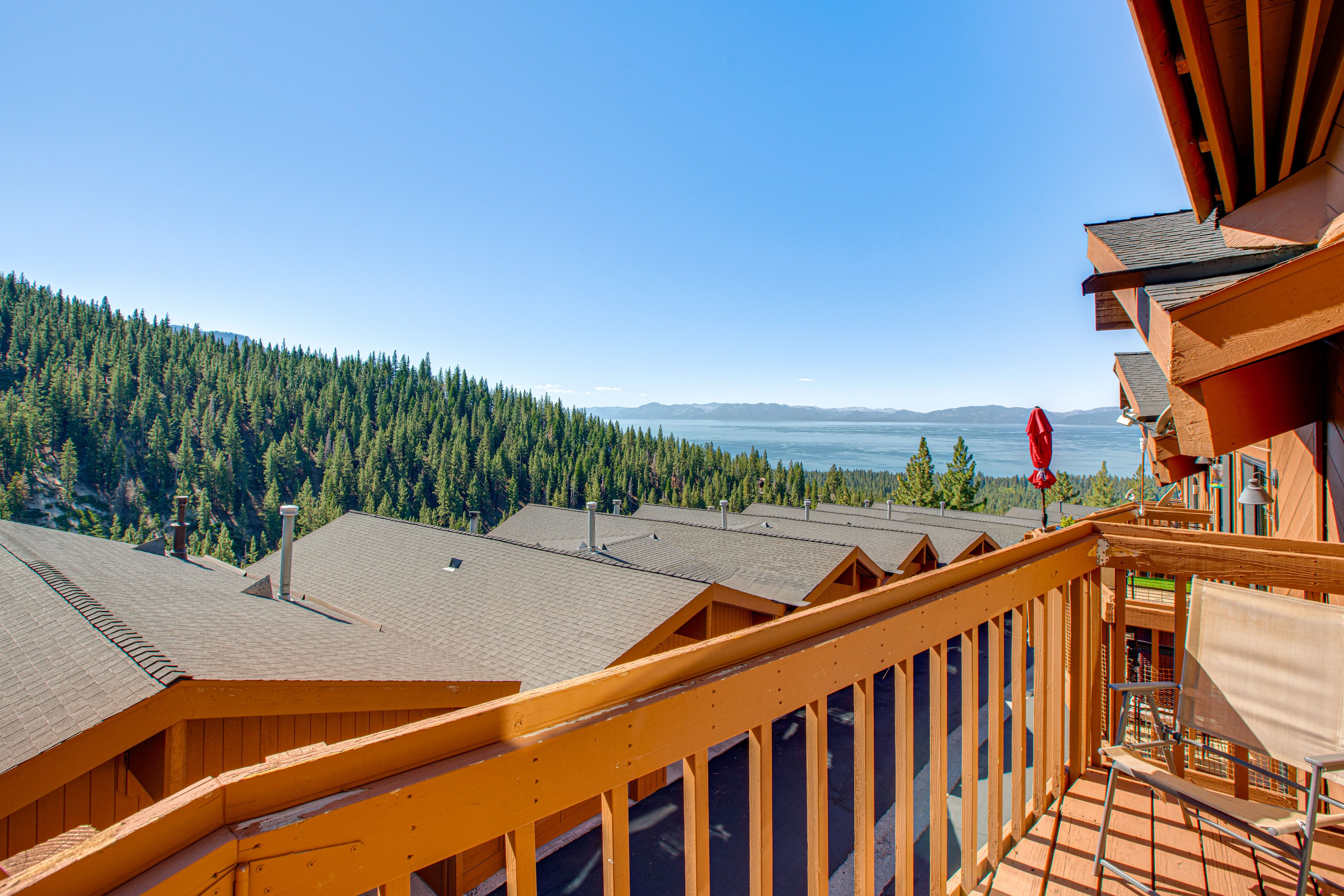 Private Balcony | Gas Grill | Mountain & Lake Views