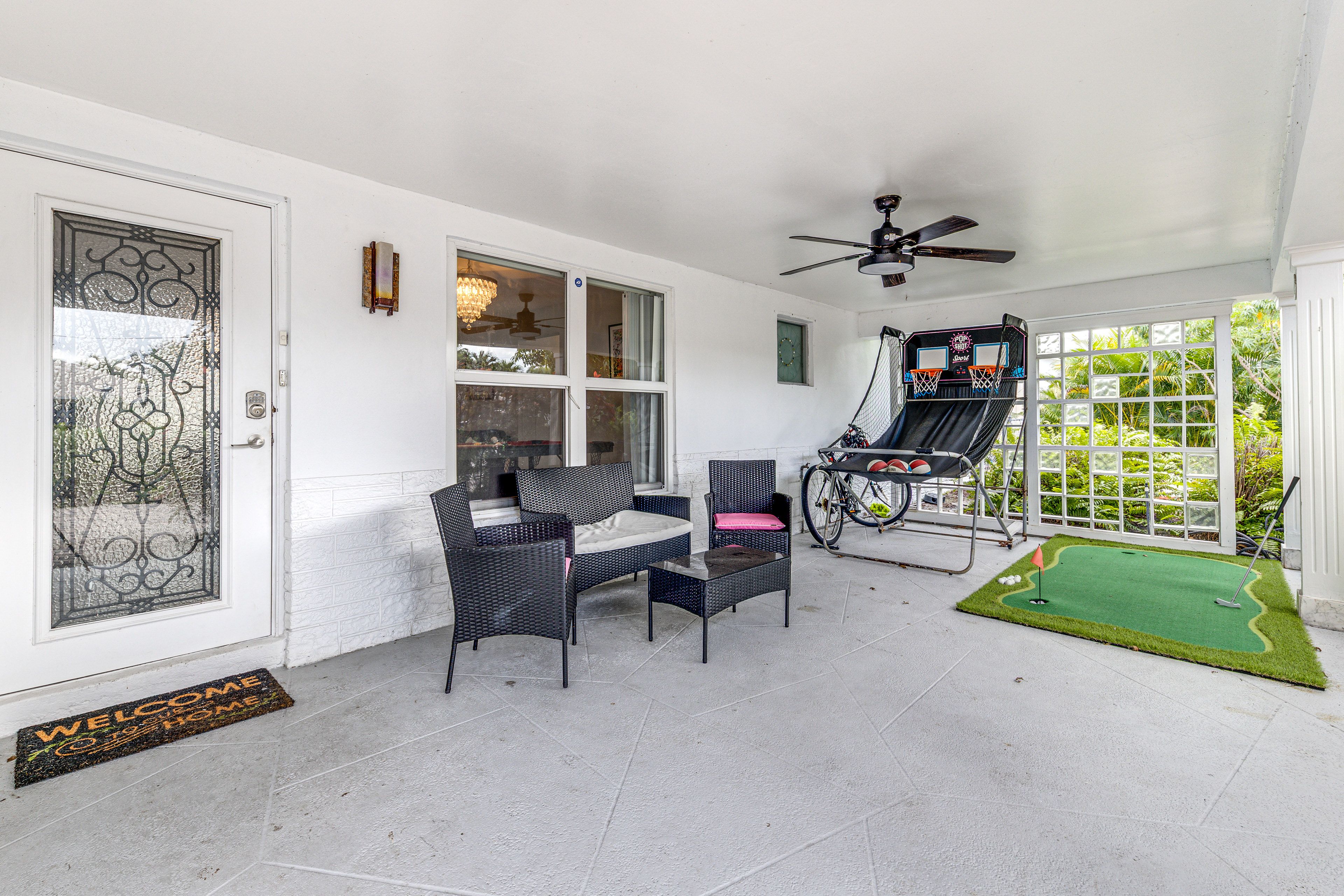 Front Porch | Putting Green | Arcade Basketball Game