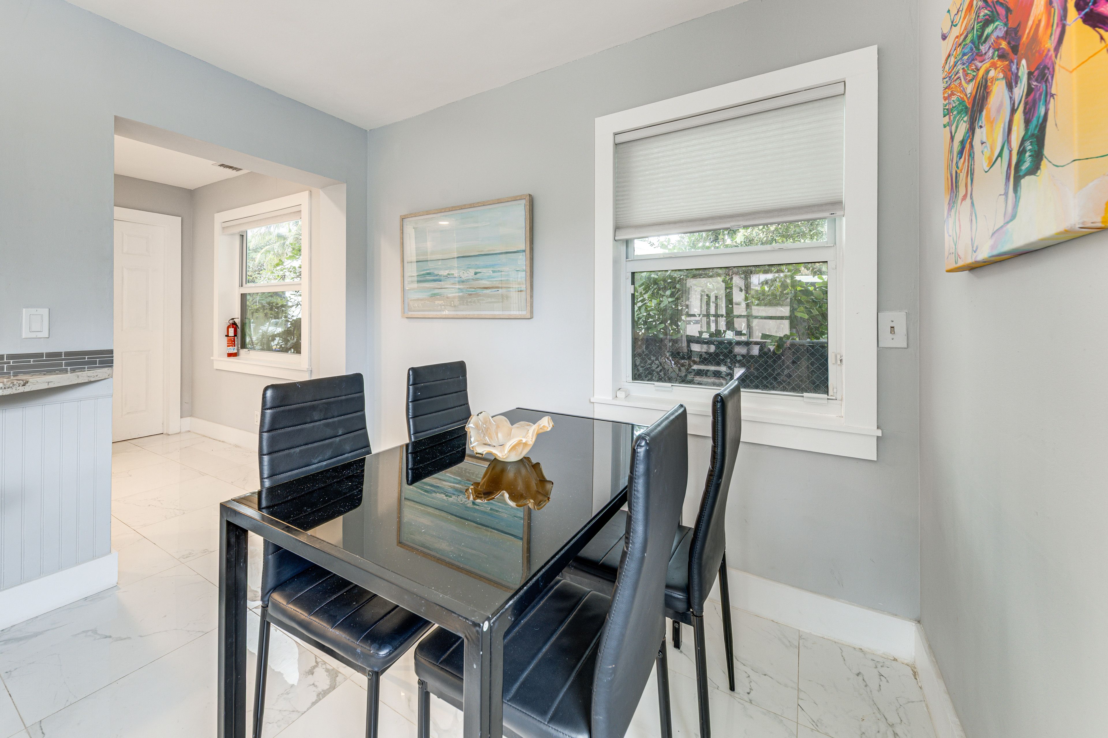 Dining Room | 2 Dining Tables | Breakfast Bar | Dishware/Flatware Provided