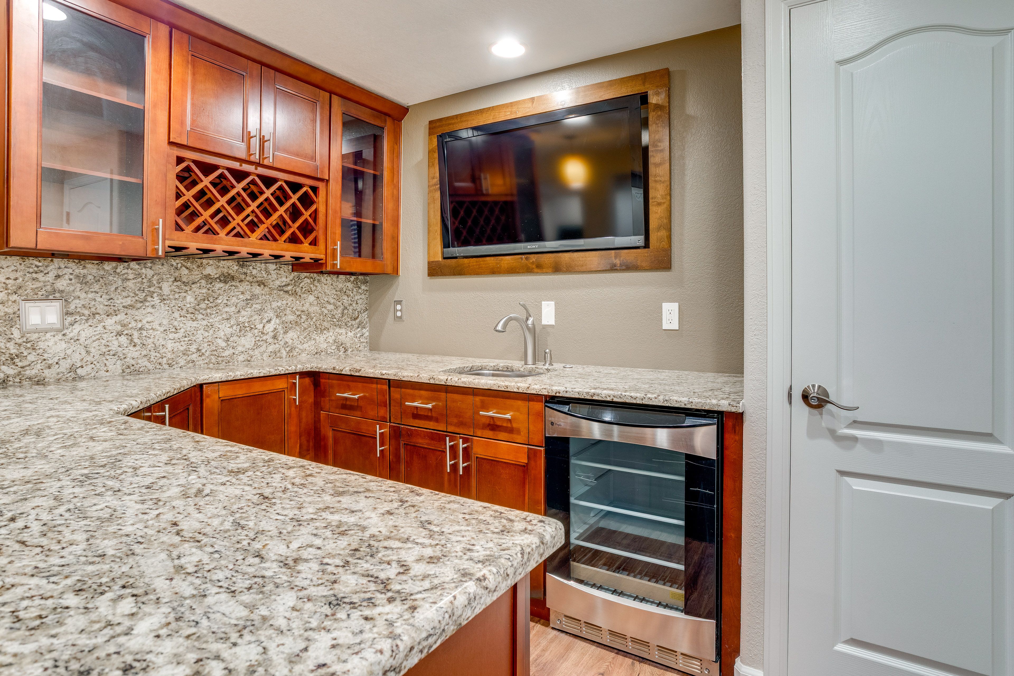 Wet Bar | Lower Floor | TV | Wine Fridge | Sink