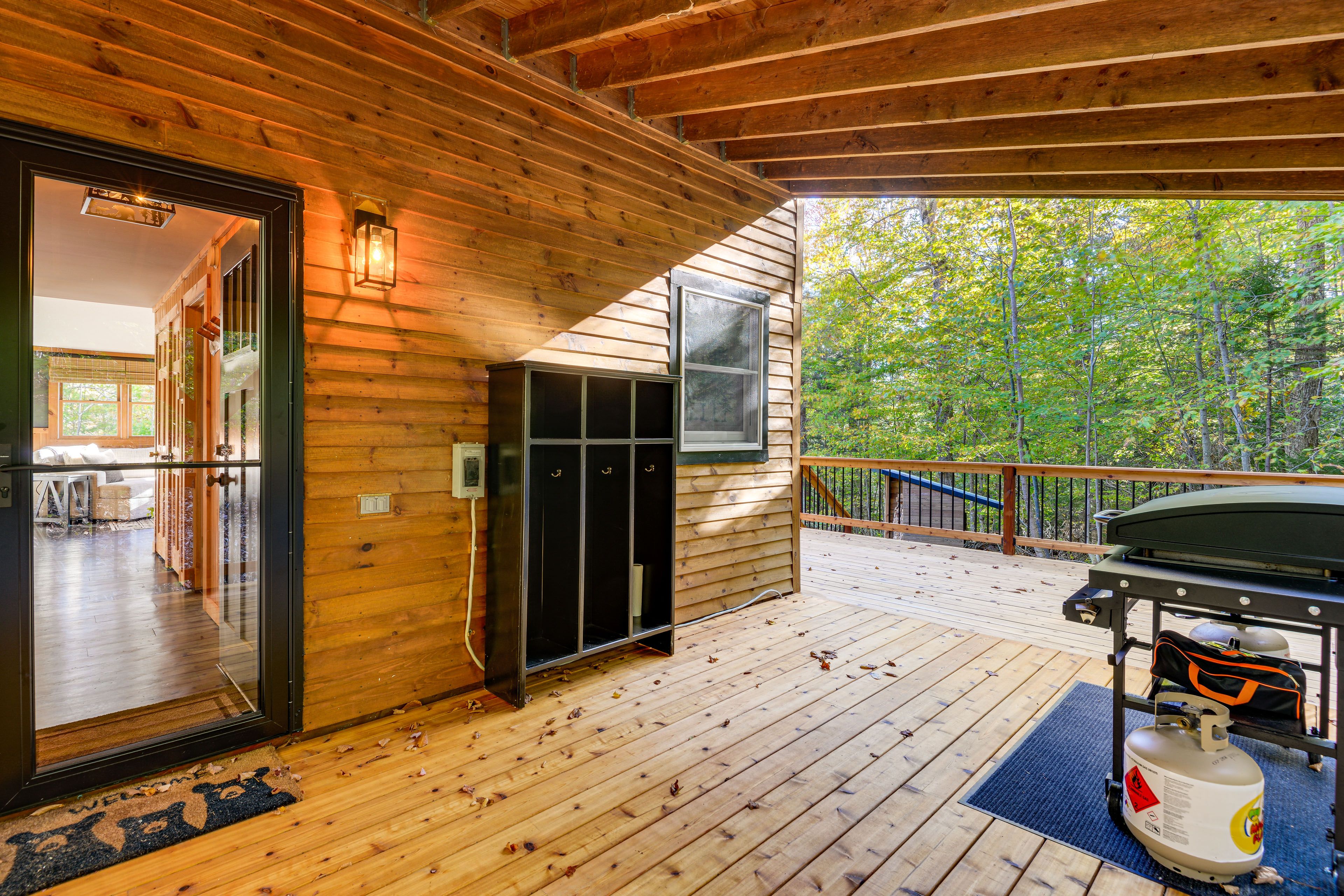 House Exterior | Partially Covered Wraparound Deck | Gas Griddle