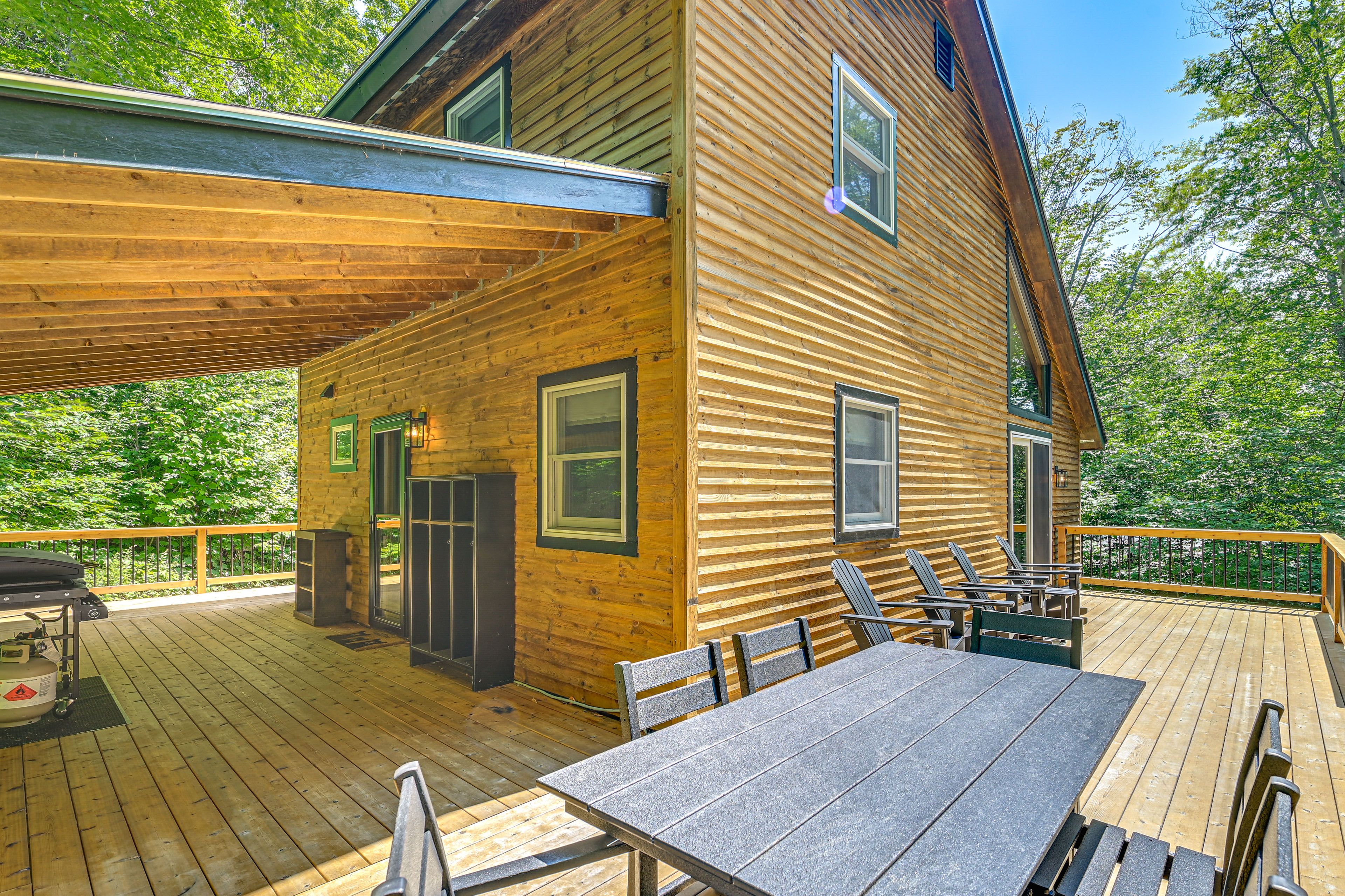 Wraparound Deck | Gas Griddle | Dining Area | Forest Views