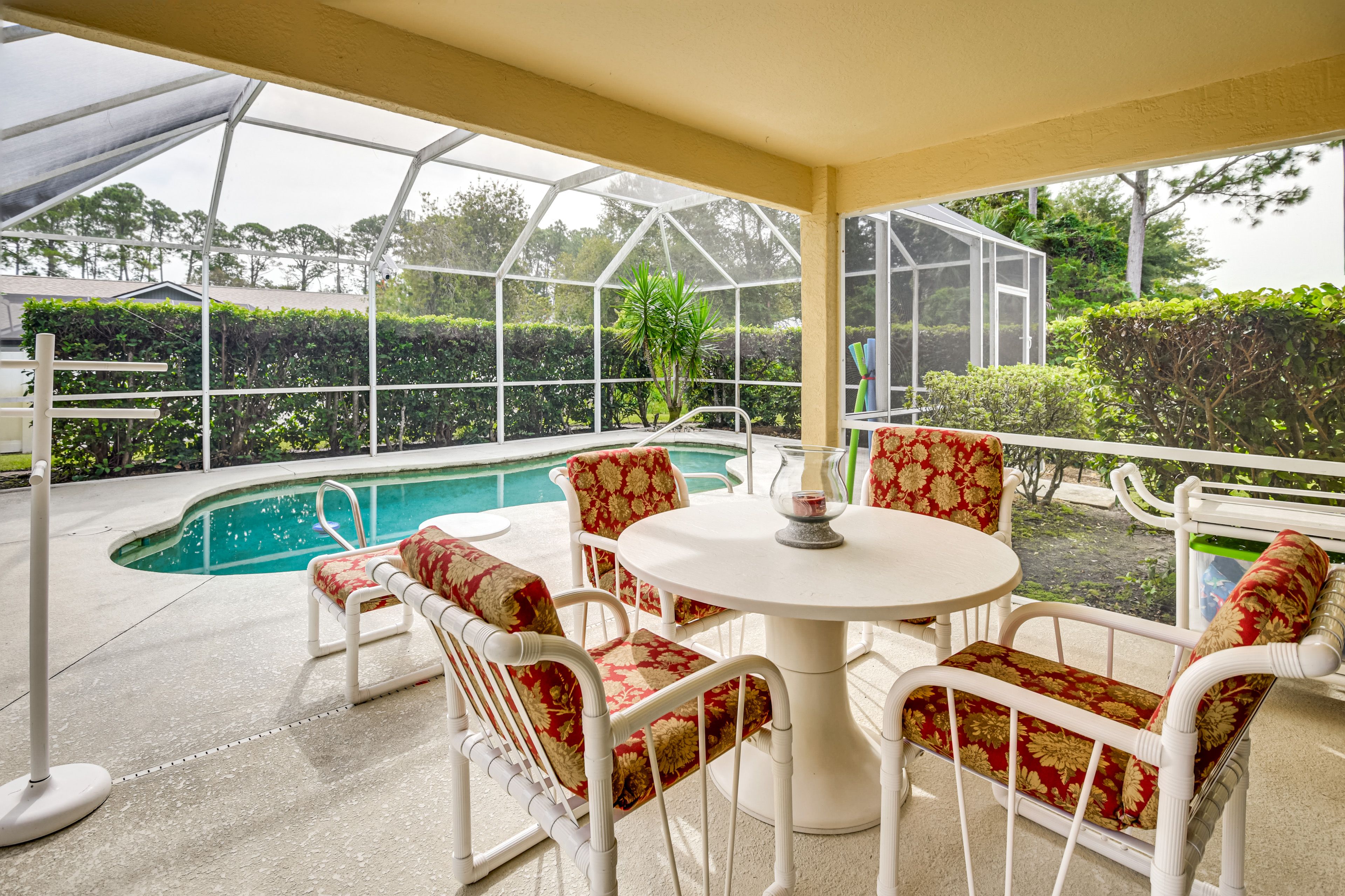 Covered Patio | Screened-In Pool | 5 Mi to Jungle Hut Road Park Beach