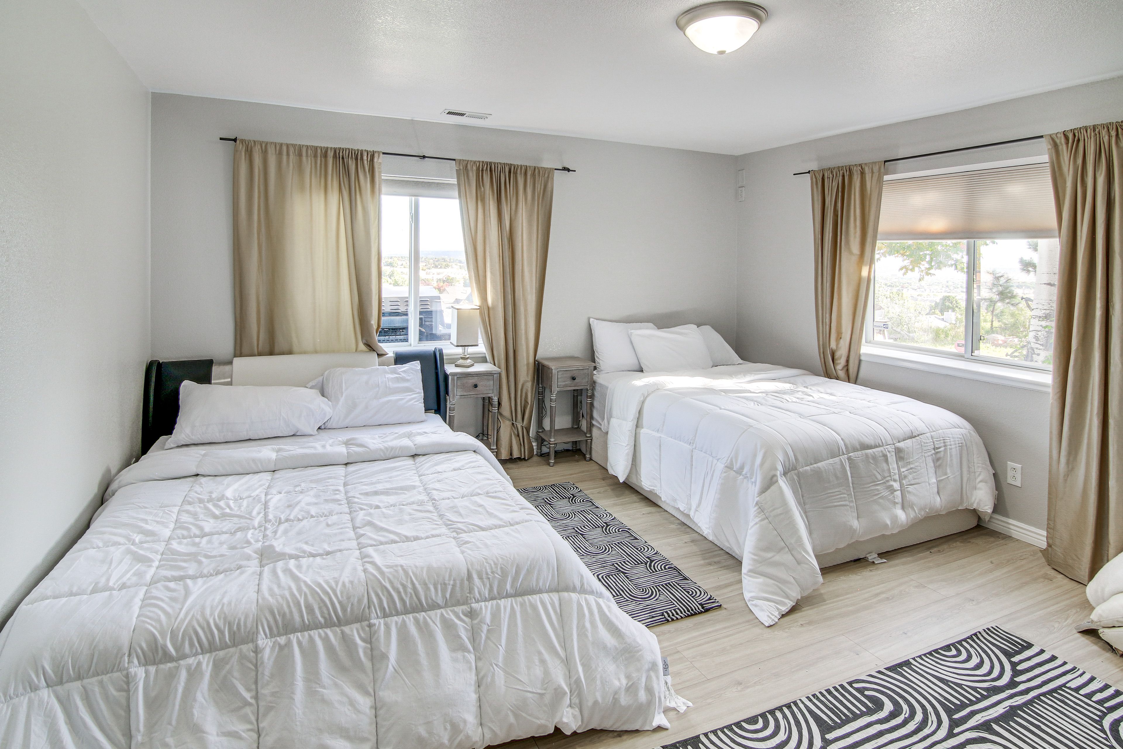Bedroom 1 | 2 Queen Beds | Linens Provided