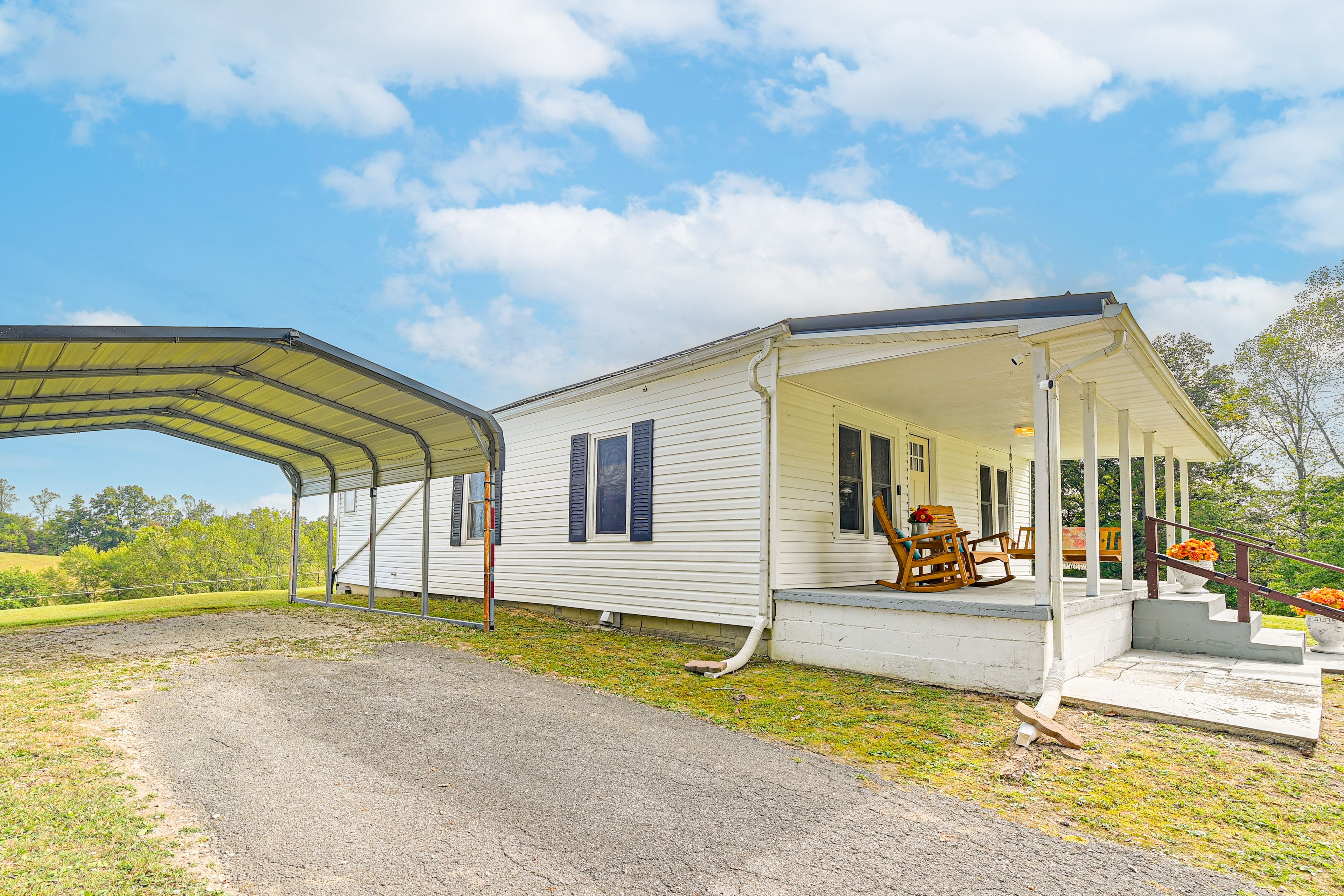 Exterior | Parking | Carport (2 Vehicles) | Driveway (4 Vehicles)