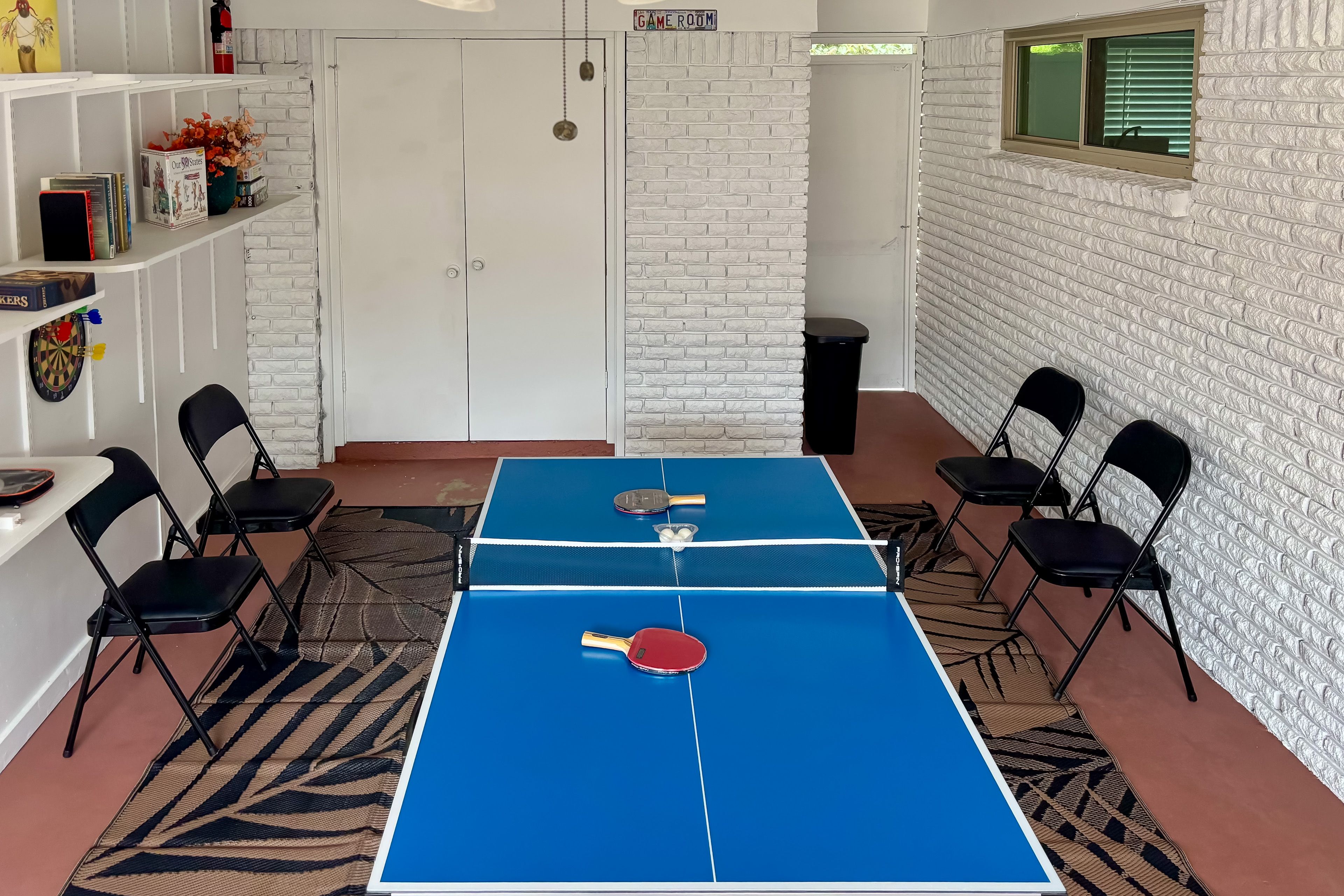 Screened-In Game Room | Ping-Pong Table | Board Games | Books