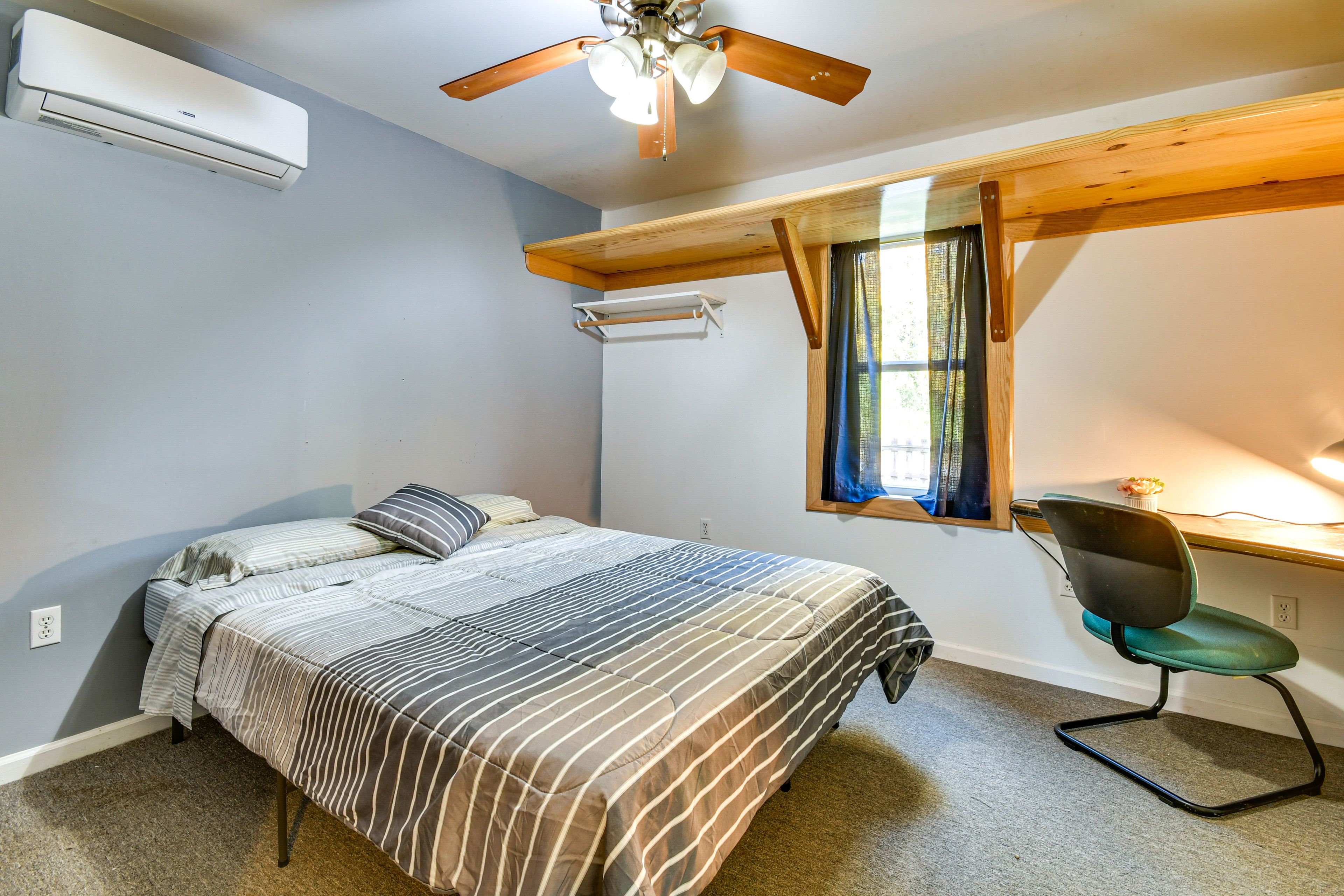 Bedroom 1 | 1st Floor | Queen Bed | Linens Provided | Workspace