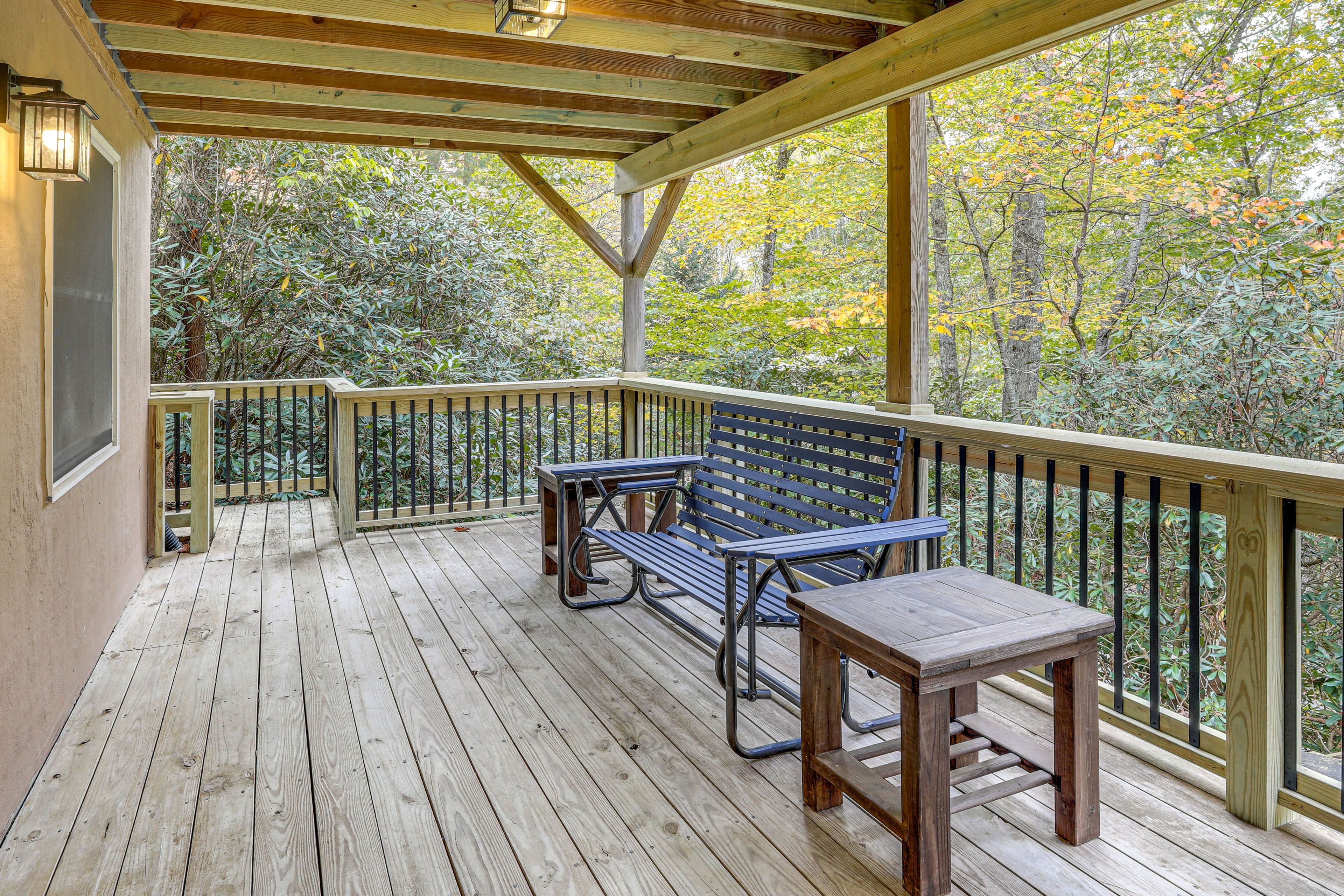 House Exterior | Covered Lower Deck w/ Seating