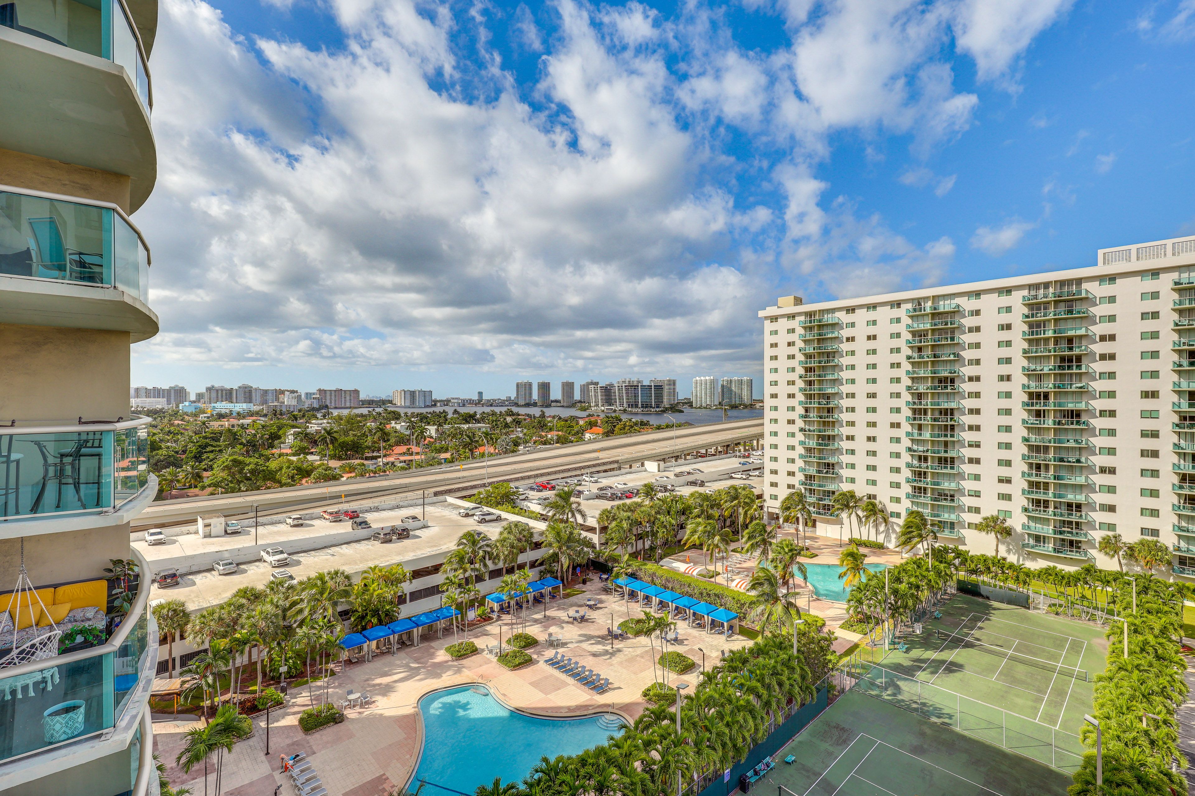 Private Balcony | Pool & Tennis Court Views