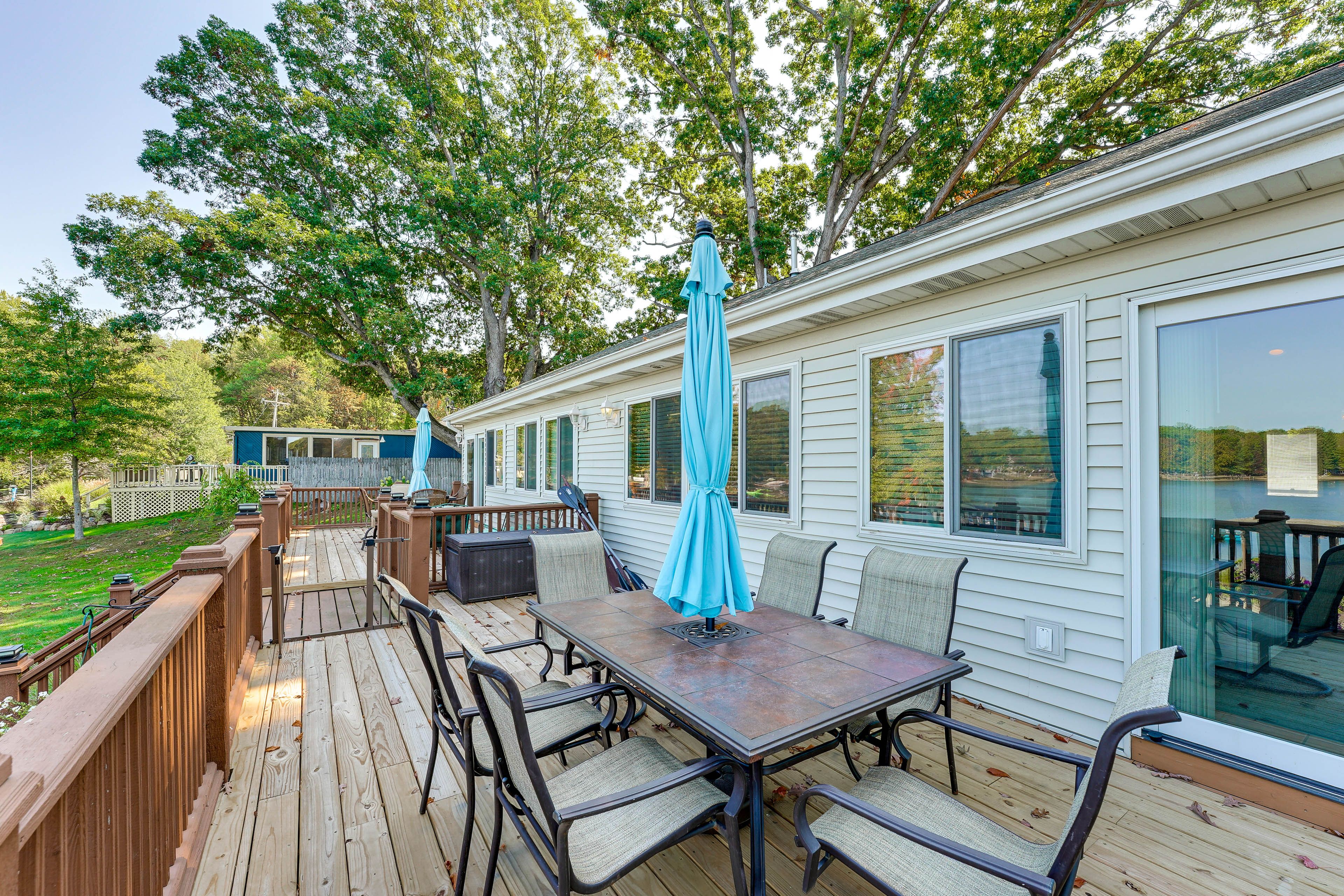 Furnished Deck | Ample Dining Space | Child Safety Gate