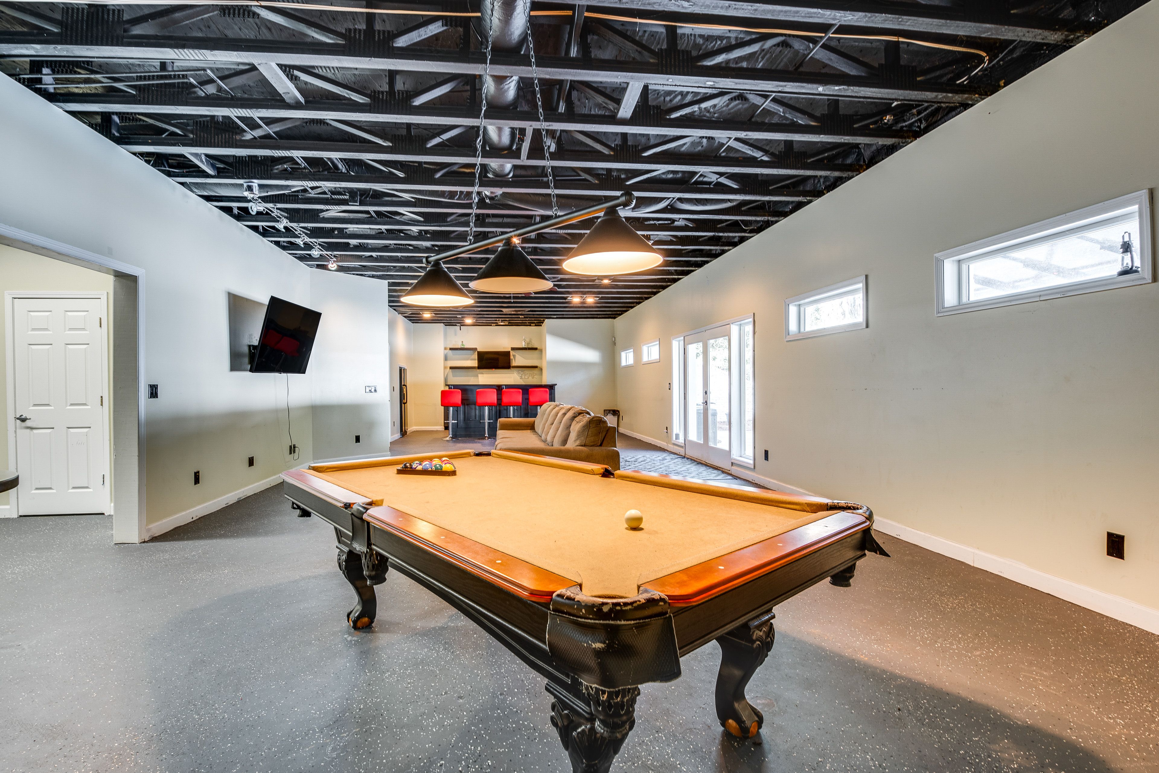 Game Room | Central Heating & A/C | In-Unit Laundry