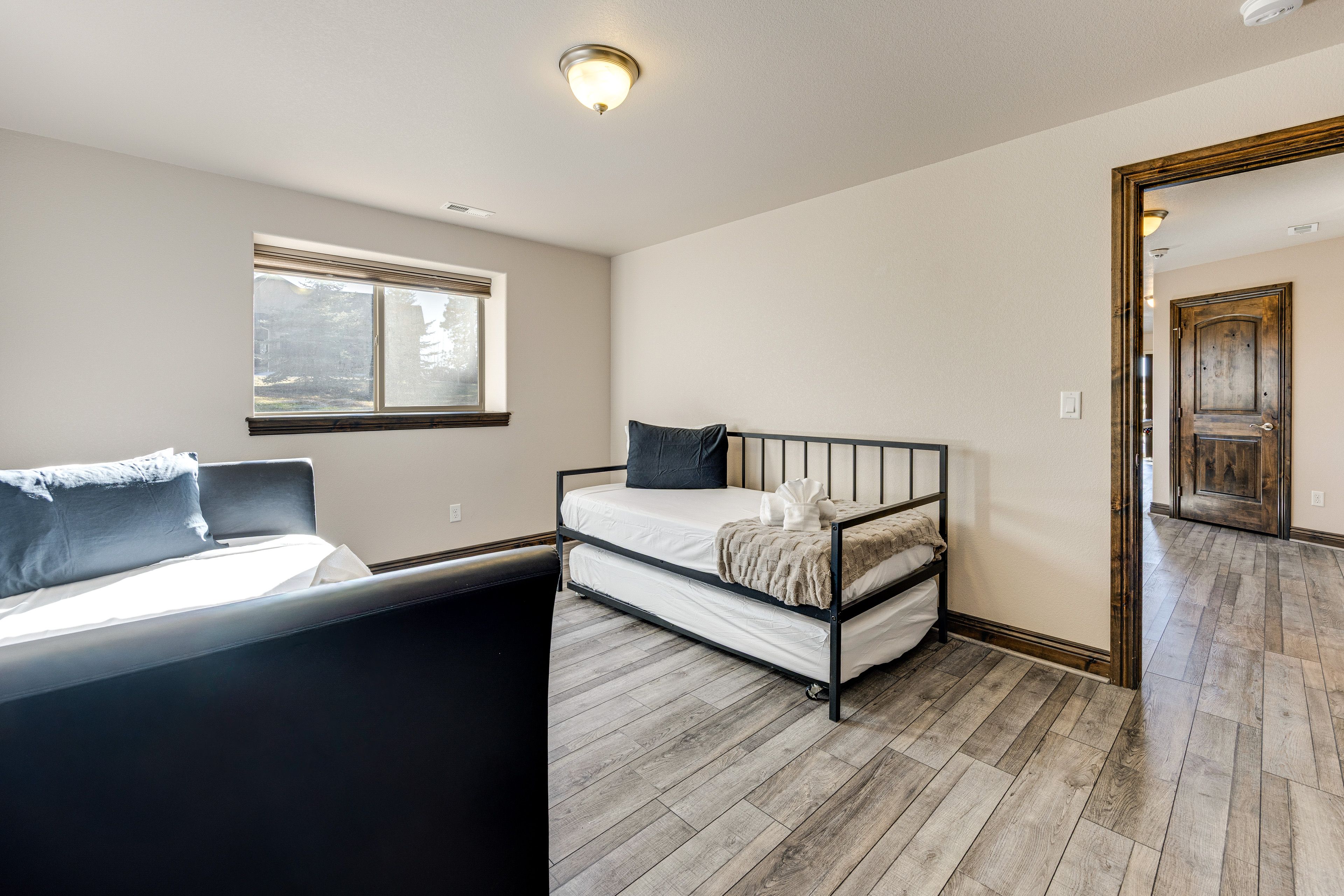 Bedroom 5 | 2 Twin Daybeds w/ Twin Trundles | Basement Level