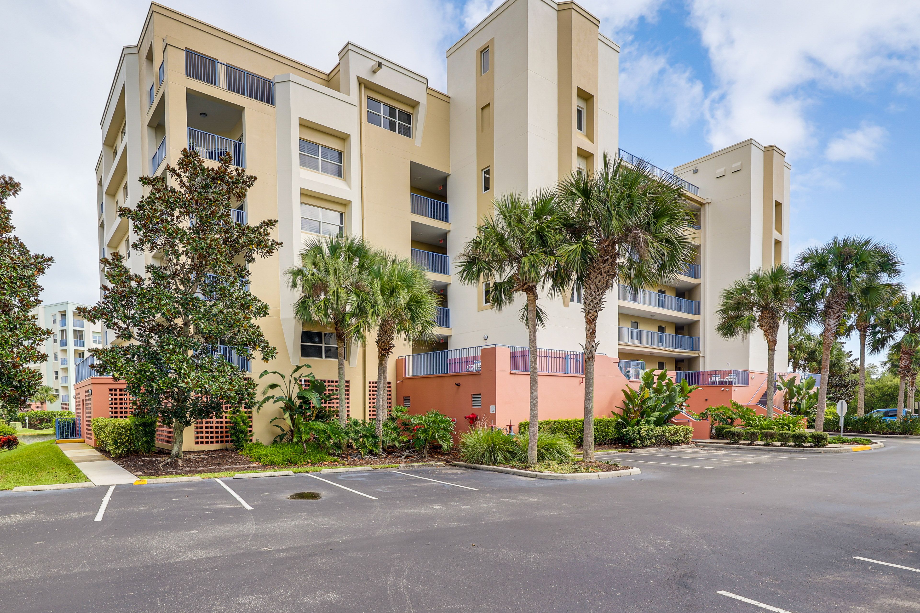 Property Exterior | Open Parking Lot (2 Vehicles; First-Come, First-Served)