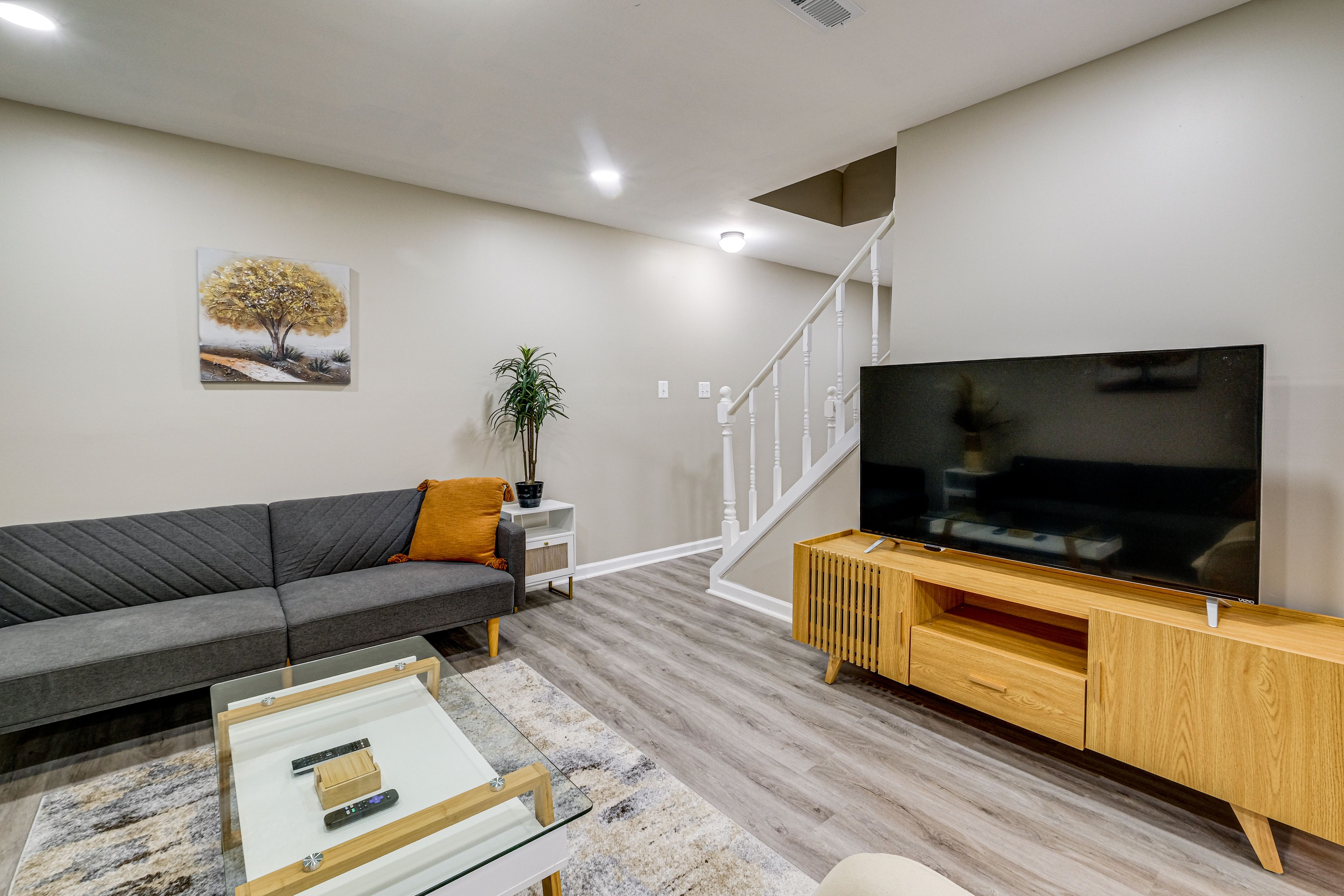 Living Room | Free WiFi | Central A/C & Heat | Basement-Level Unit