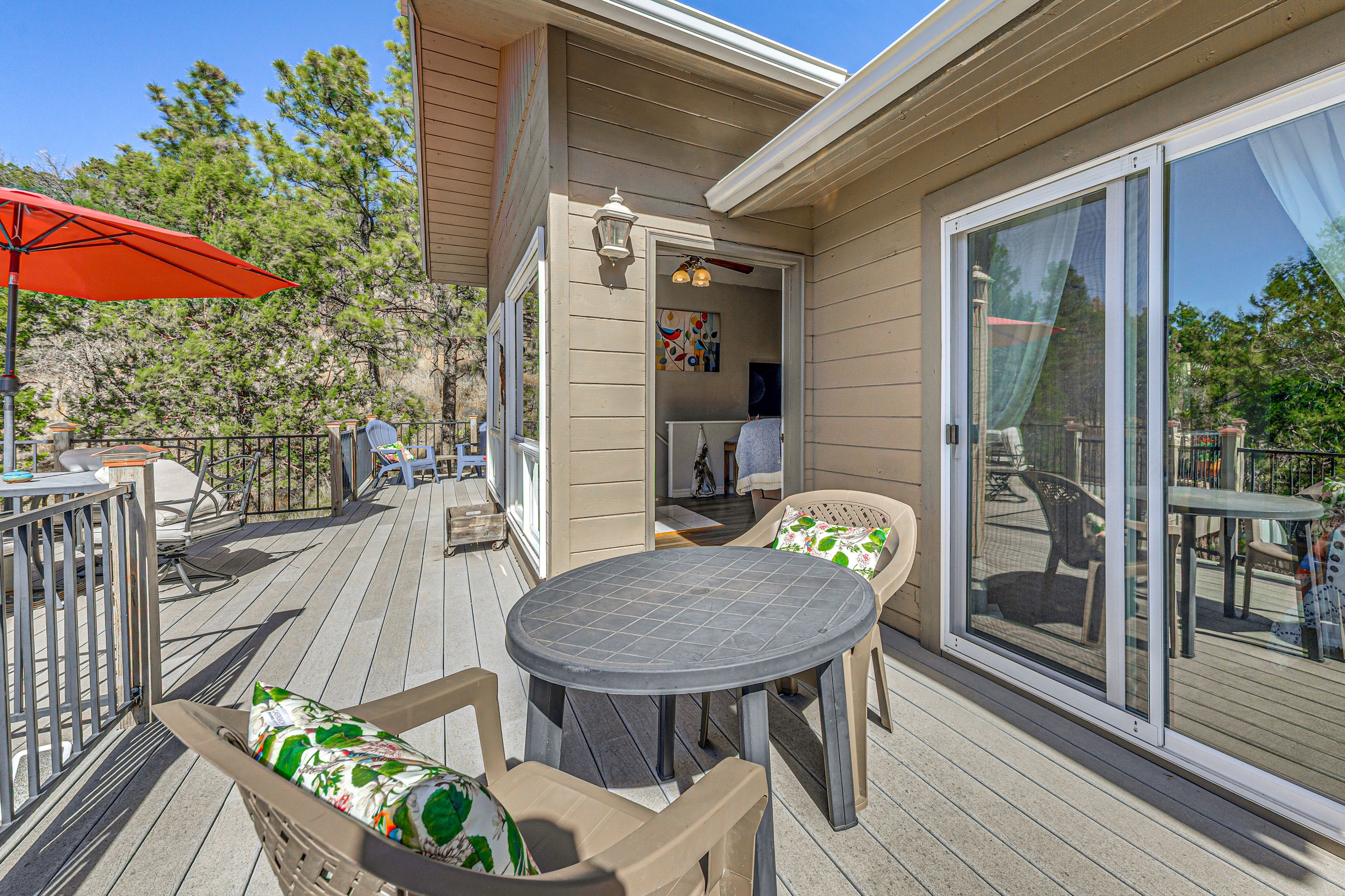 Front Deck | 2 Outdoor Dining Areas | Mountain Views