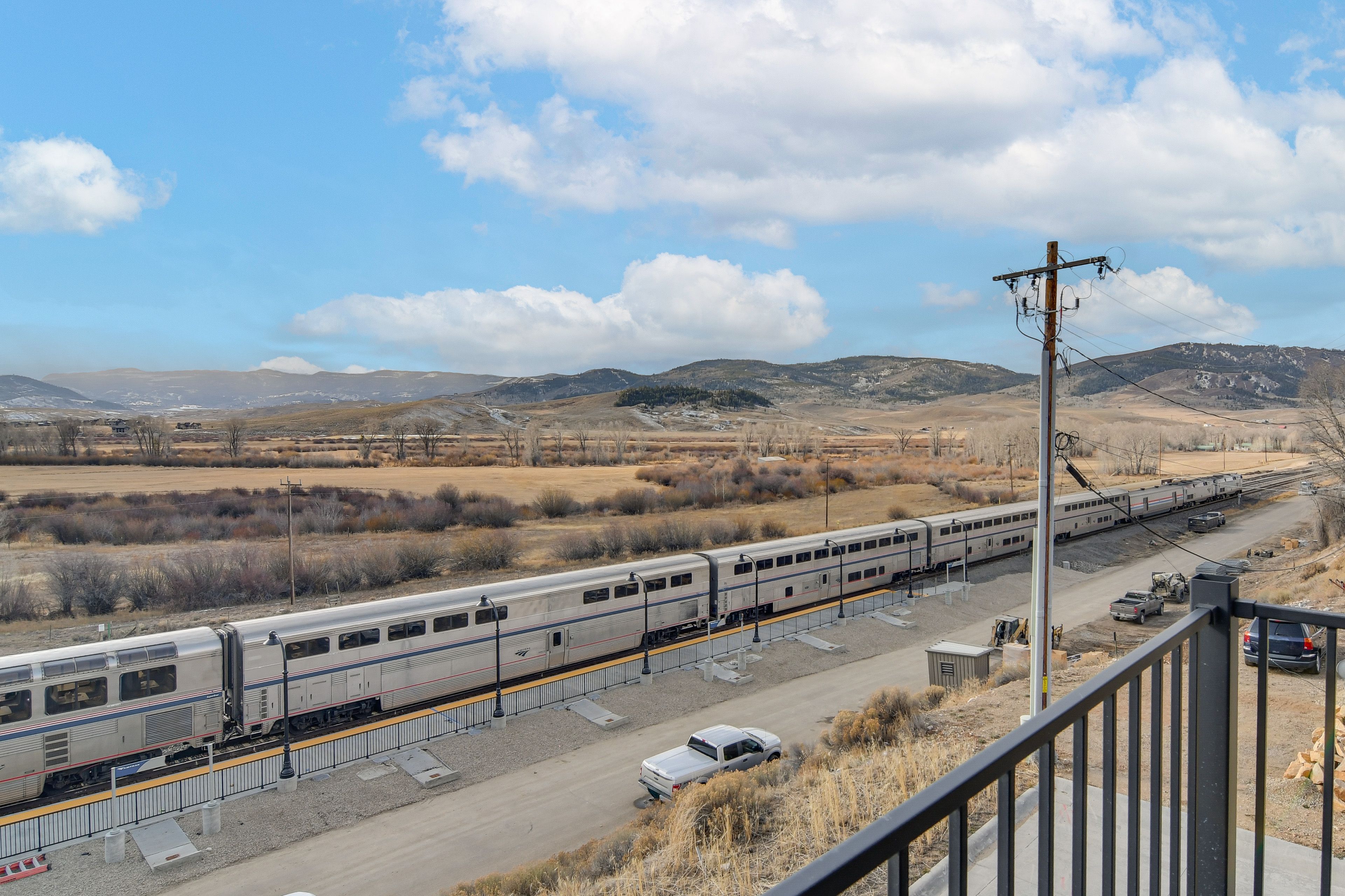 Balcony | Mountain & Train Station Views
