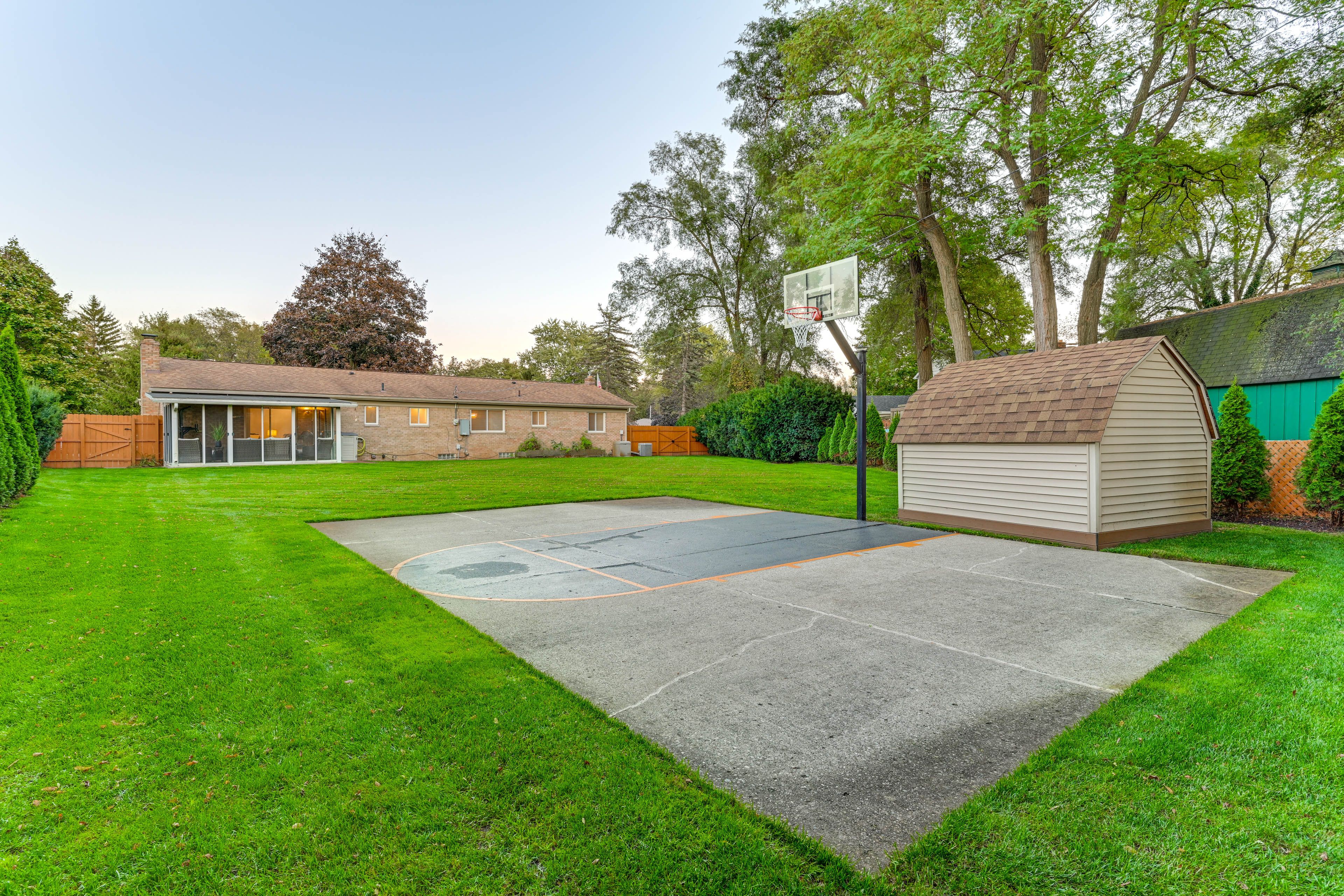 House Exterior | Fenced Backyard | Basketball Half Court