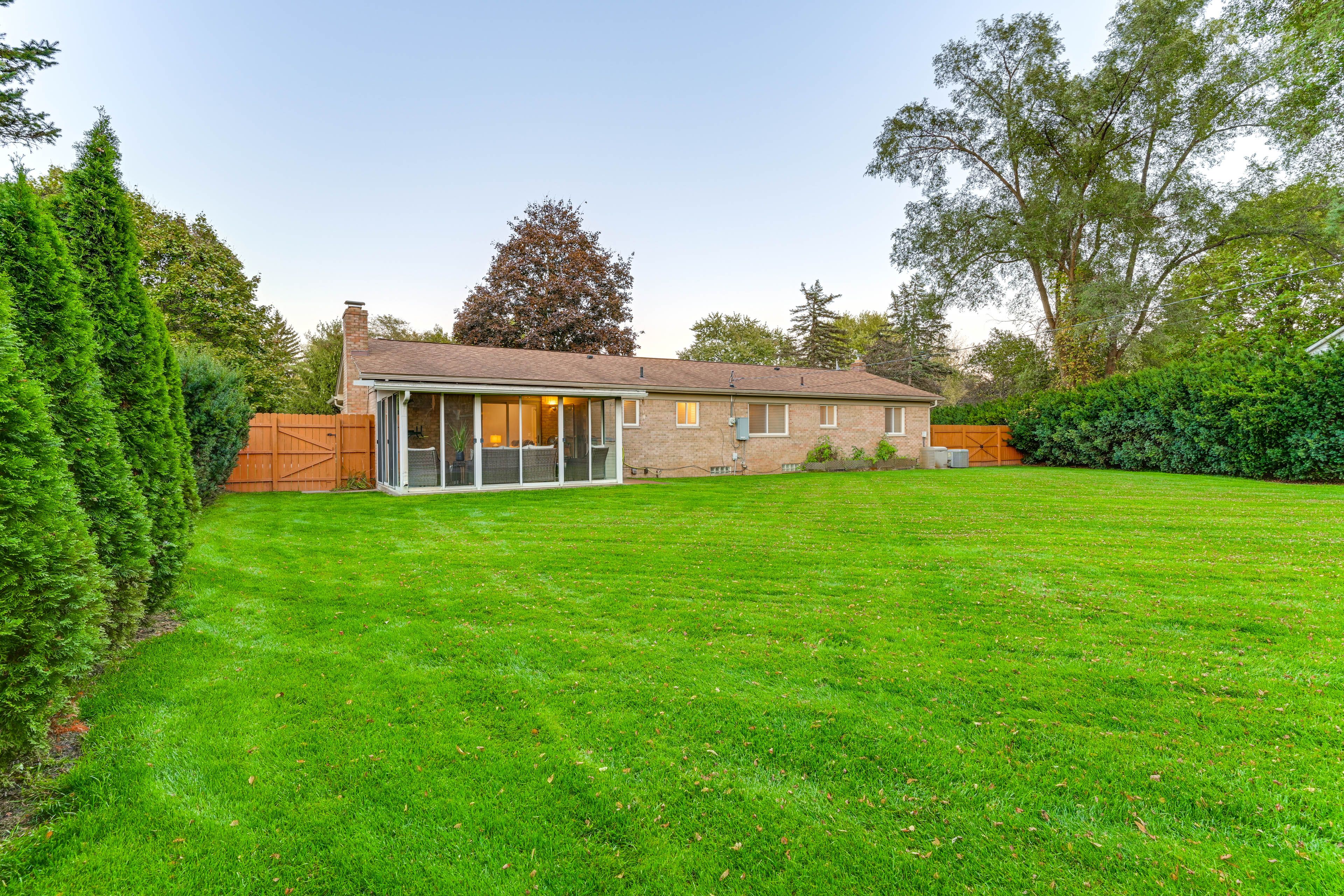 House Exterior | Fenced Backyard | Basketball Half Court