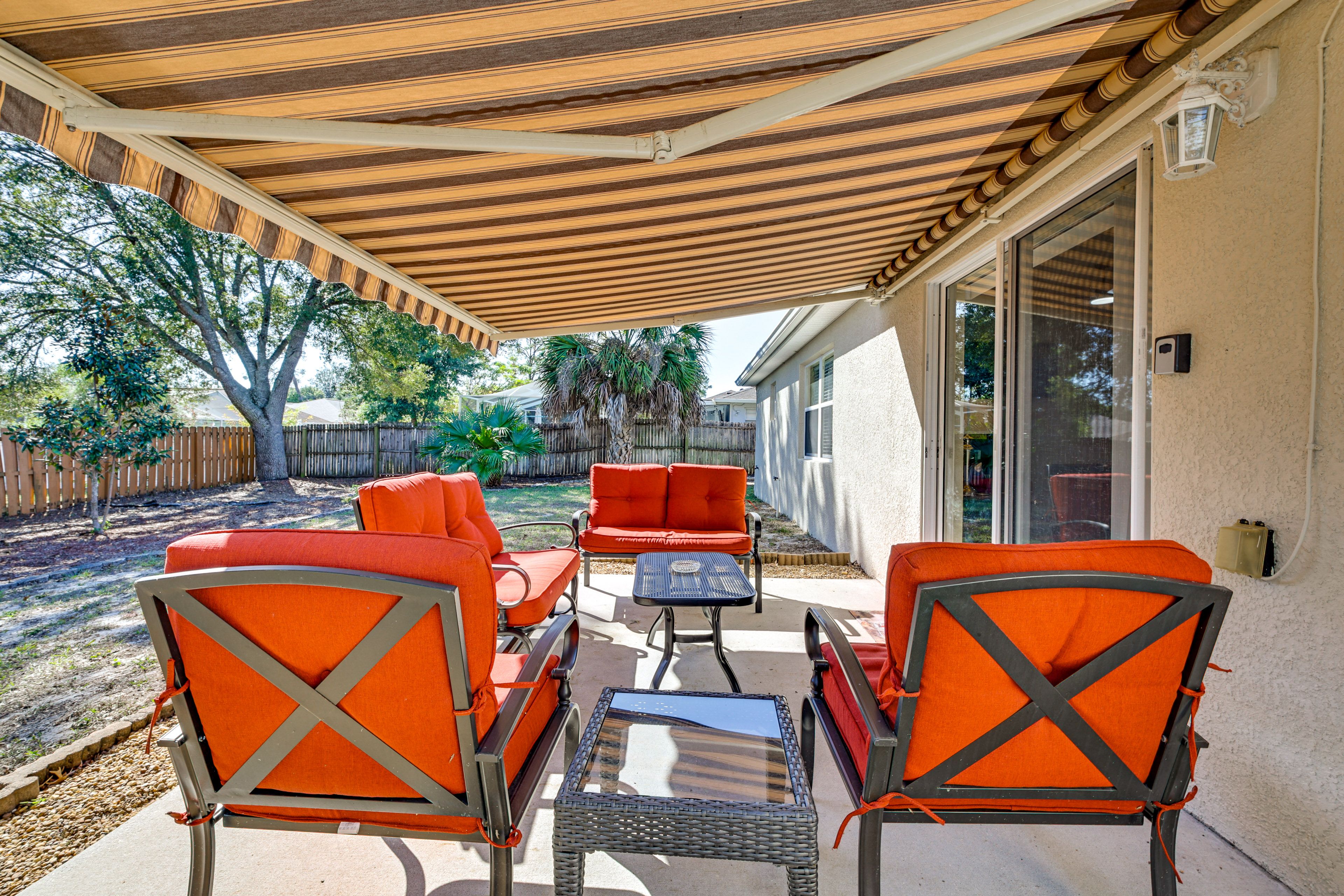 Covered Patio | 2 Glider Benches & 2 Chairs