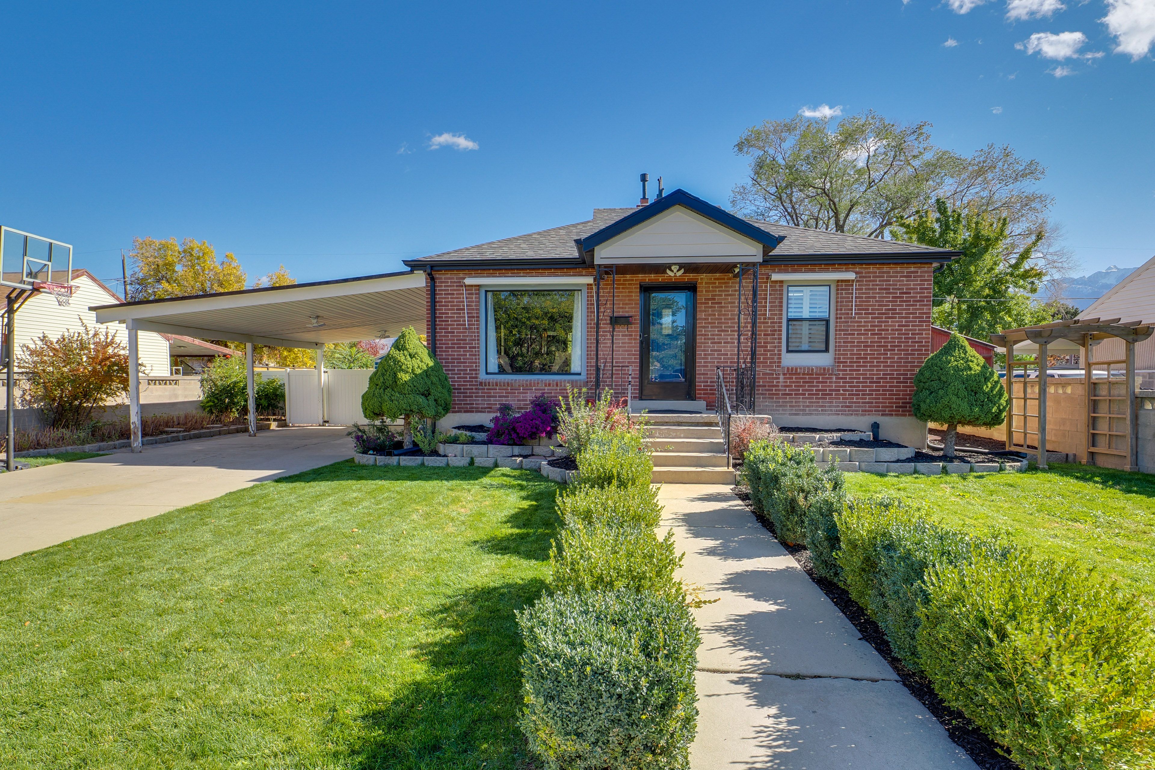 Property Exterior | 2-Story Home | Basketball Hoop | Fenced-In Yard
