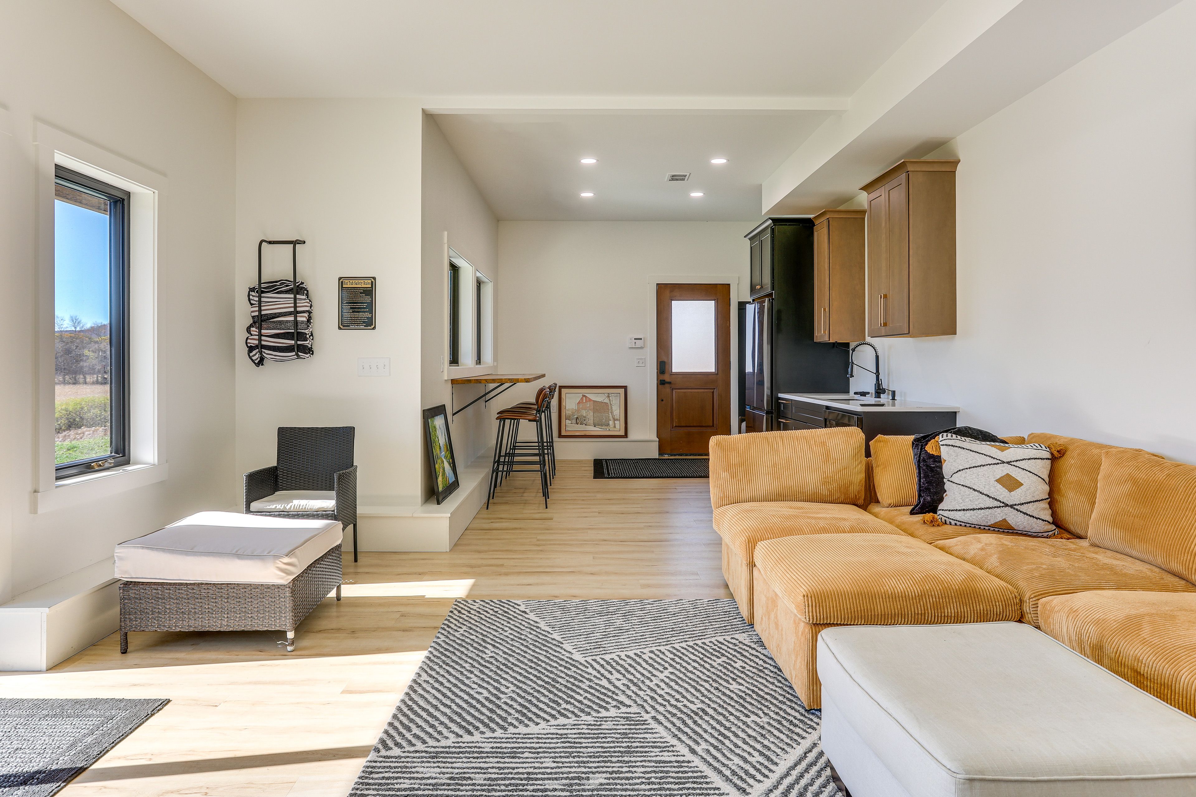 Living Room | Wet Bar | Bar Seating | Basement Level