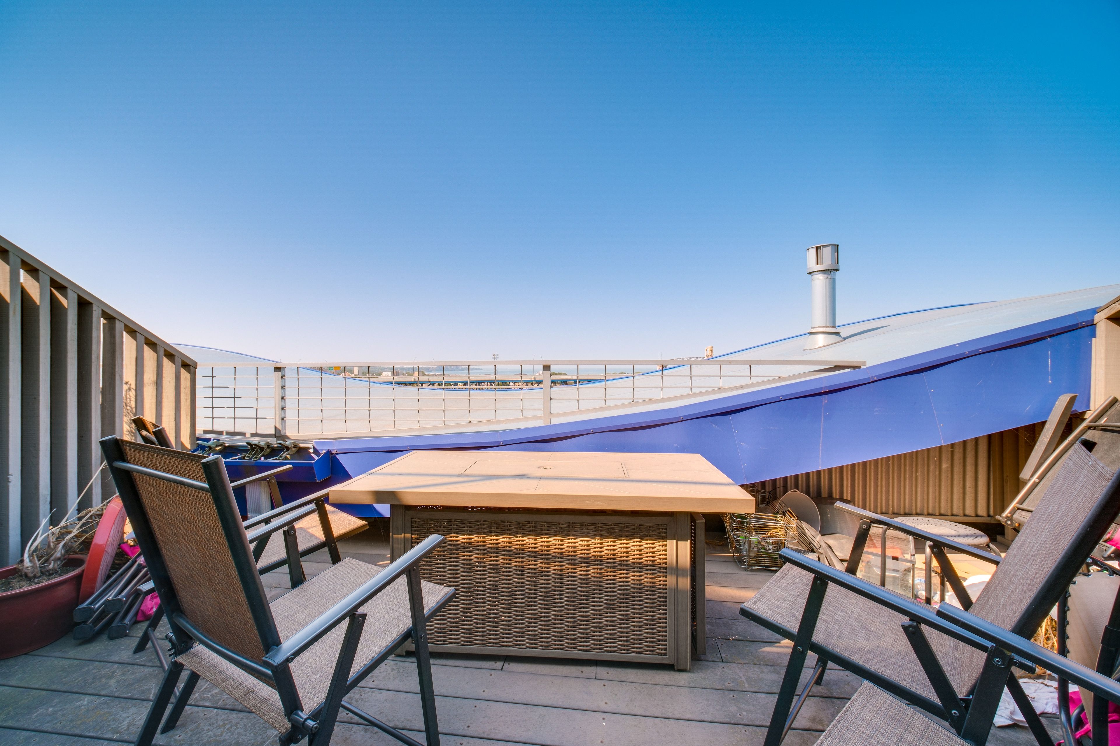 Condo Exterior | Private Balcony w/ Fire Table