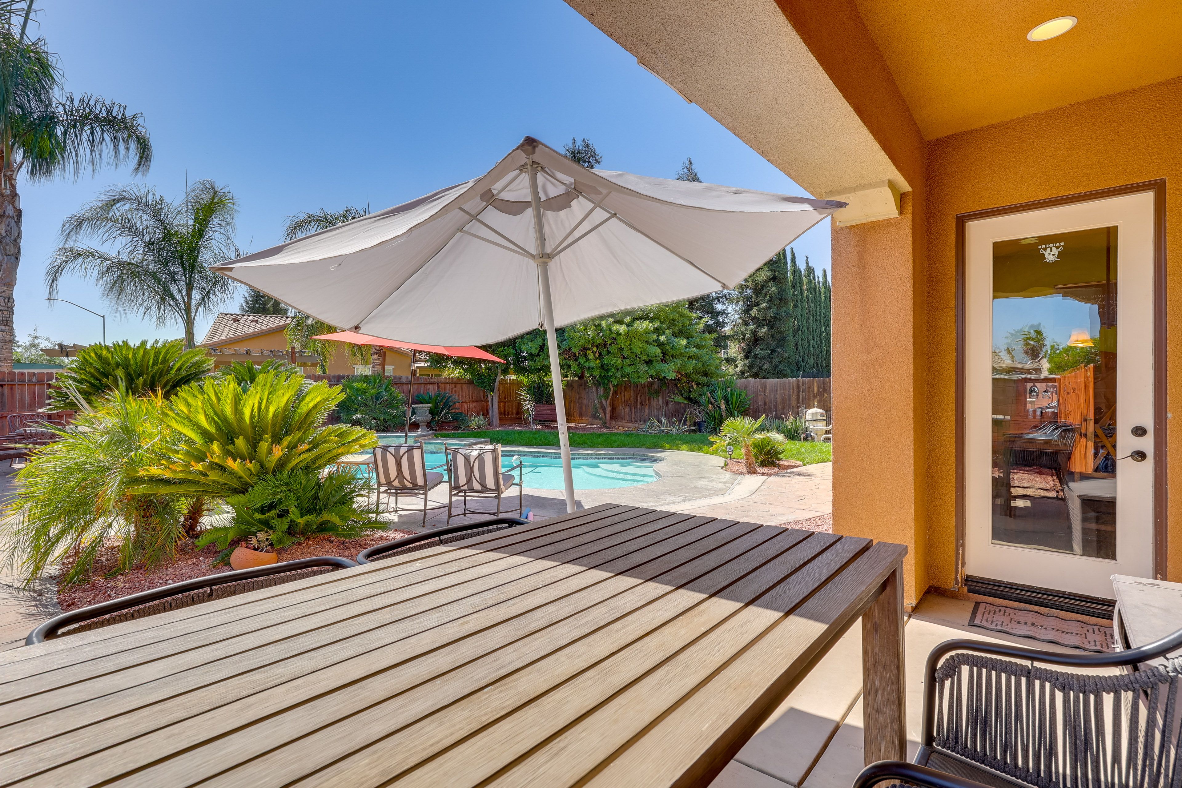 Fenced-In Yard | Dining Table | Wood-Burning Fire Pit | Gas Grill | Private Pool