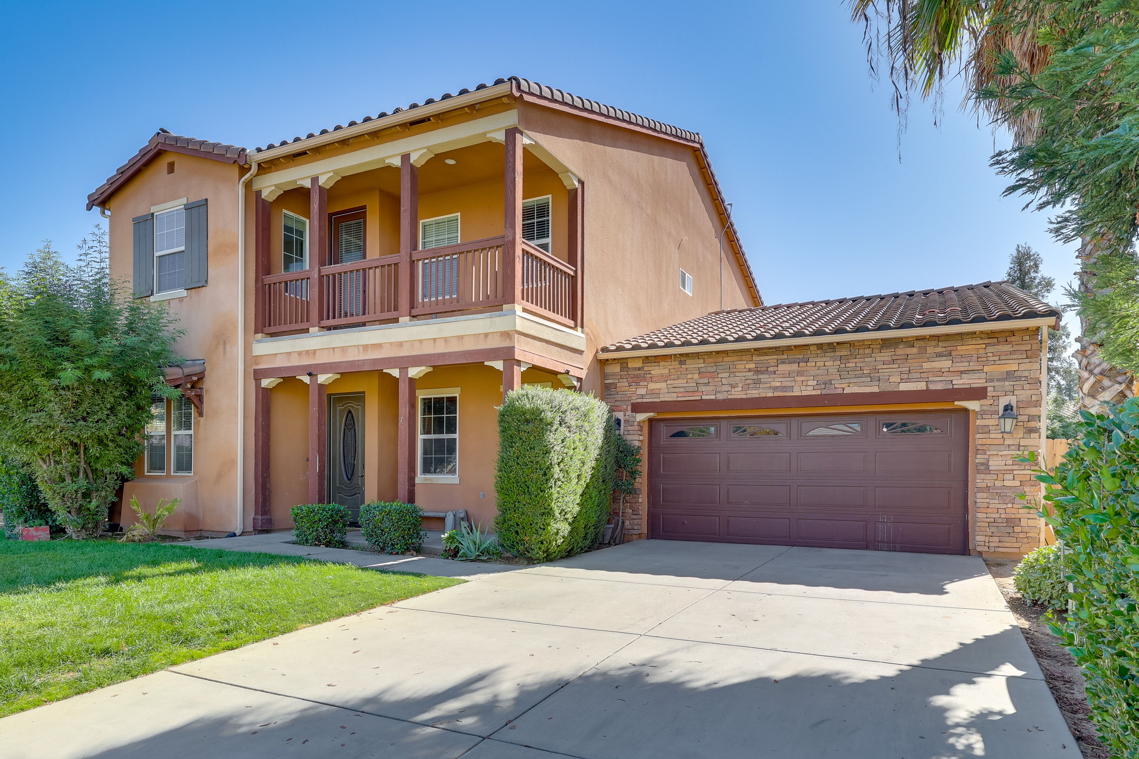 Property Exterior | Parking | Driveway (4 Vehicles) | Garage (2 Vehicles)