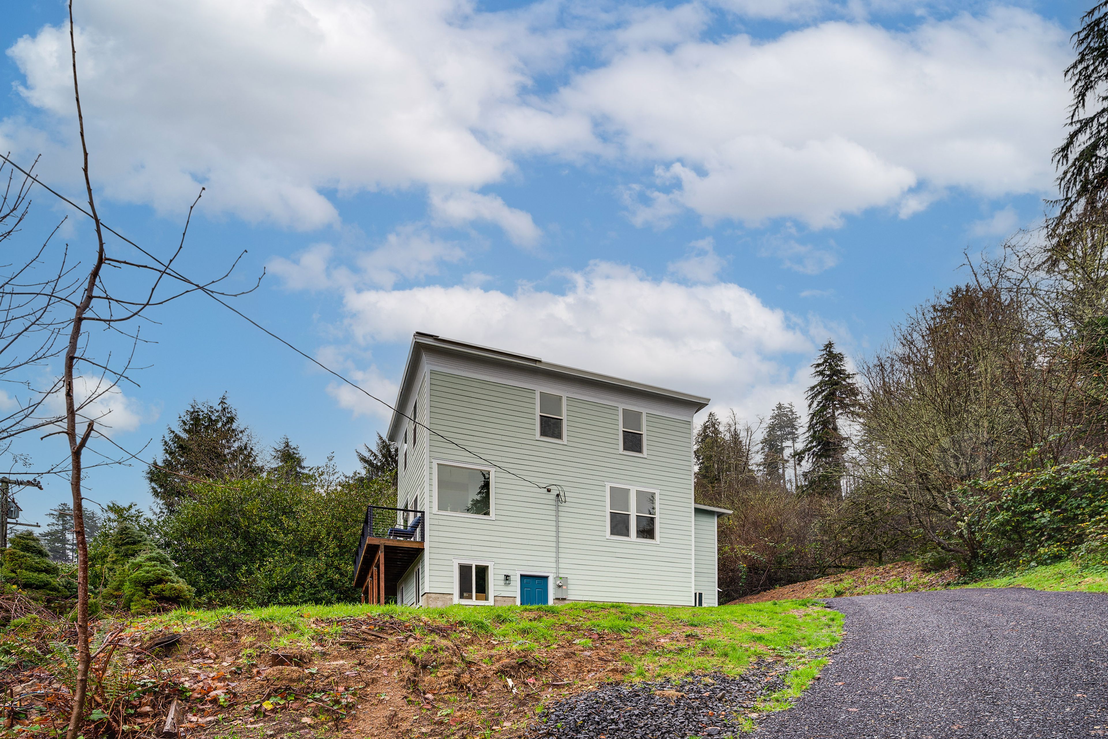 Property Exterior | Ground-Level Townhome | Shared Driveway (1 Vehicle)