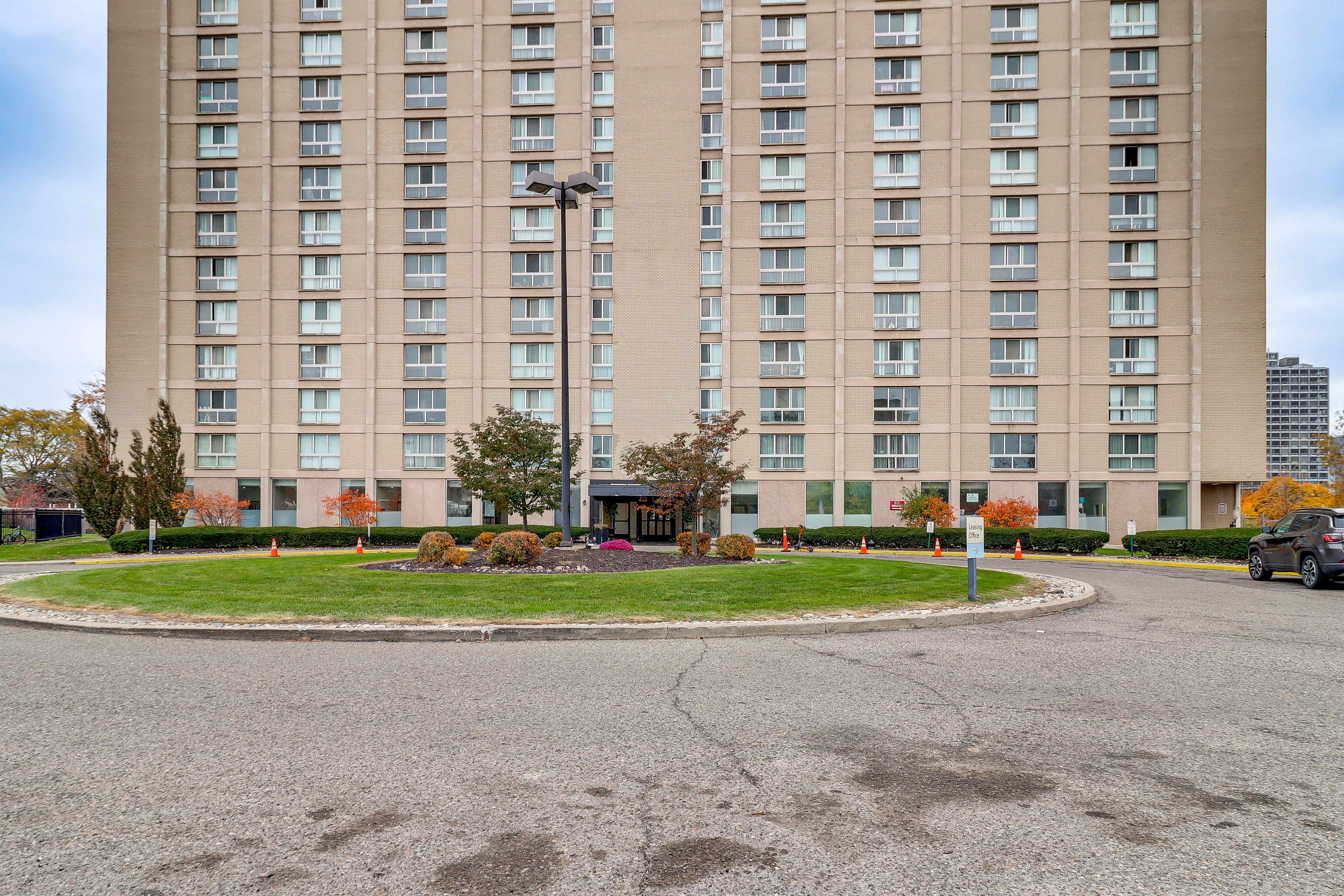 Building Exterior | Open Lot (First-Come, First-Served) | Street Parking