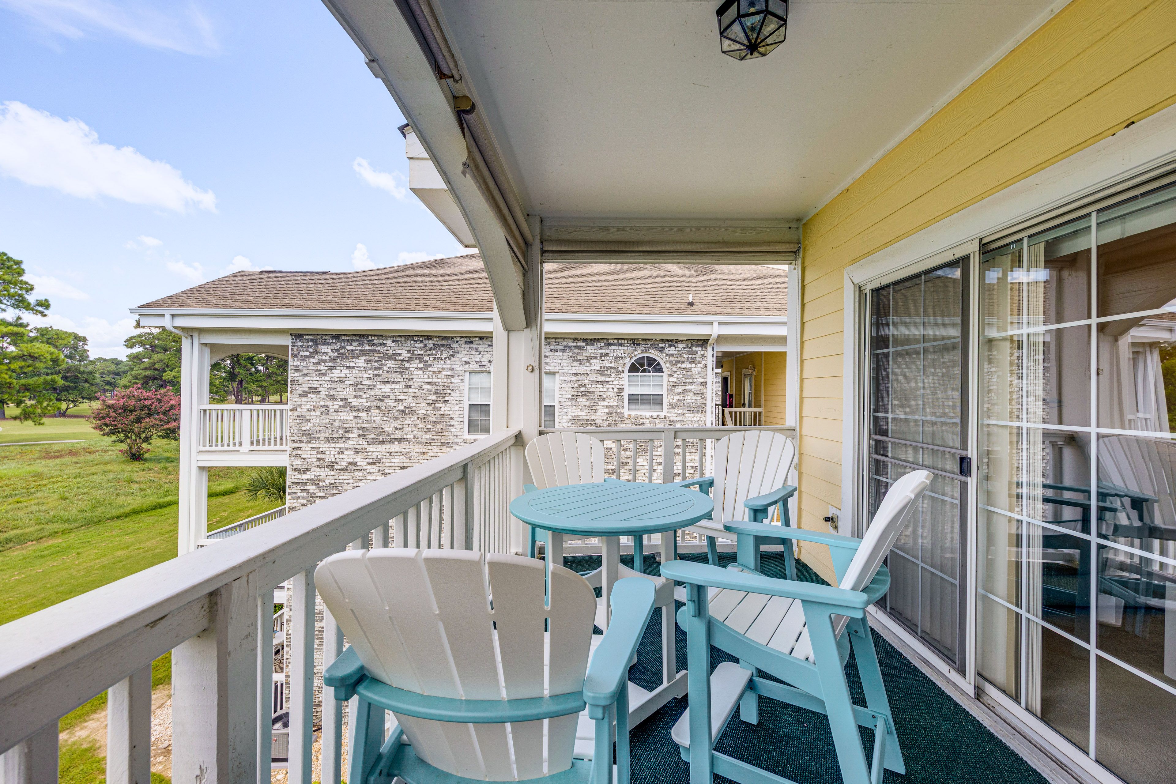 Covered Balcony | Outdoor Dining | Golf Course Views