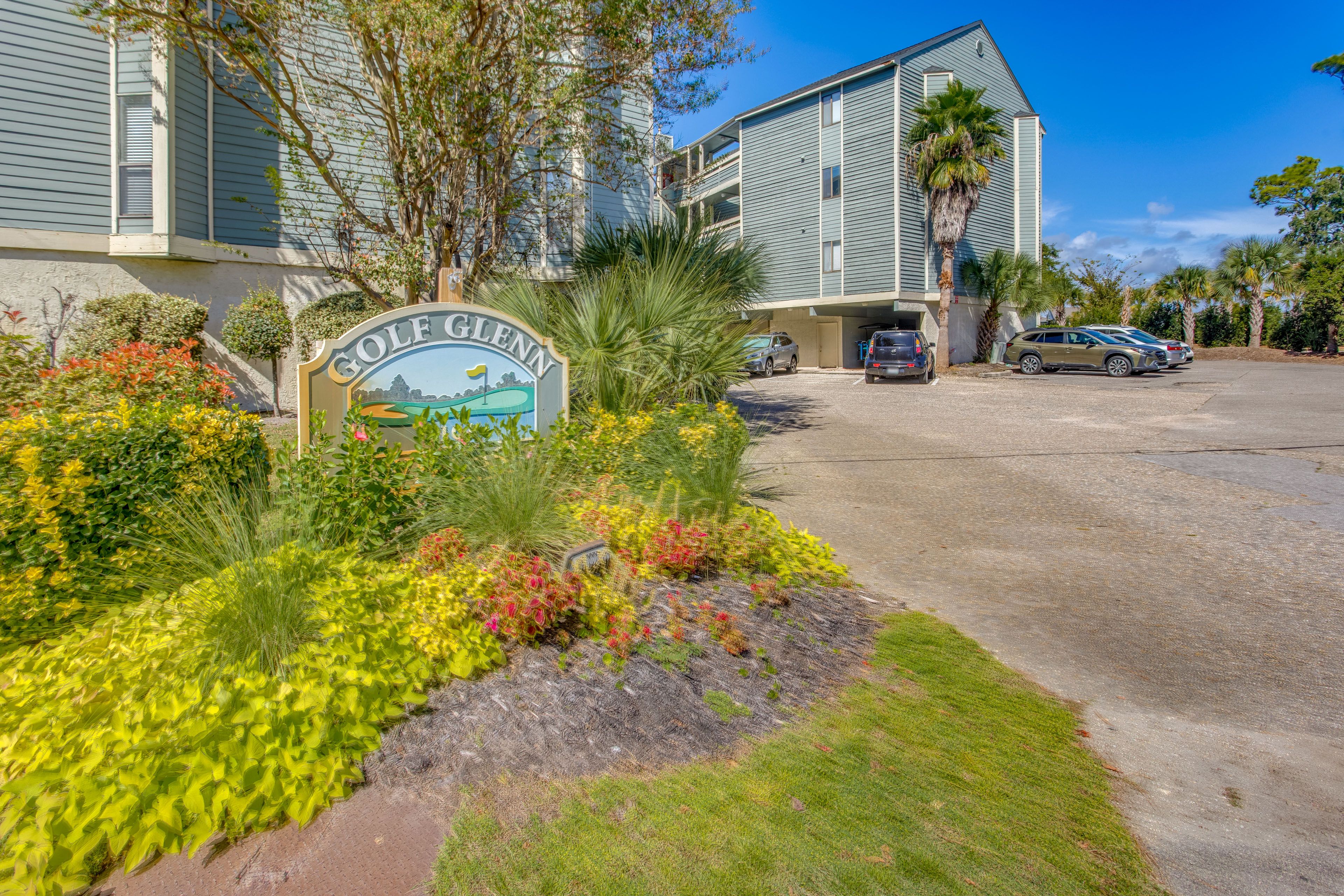 Property Exterior | Community Covered Parking Areas (3 Vehicles Max)