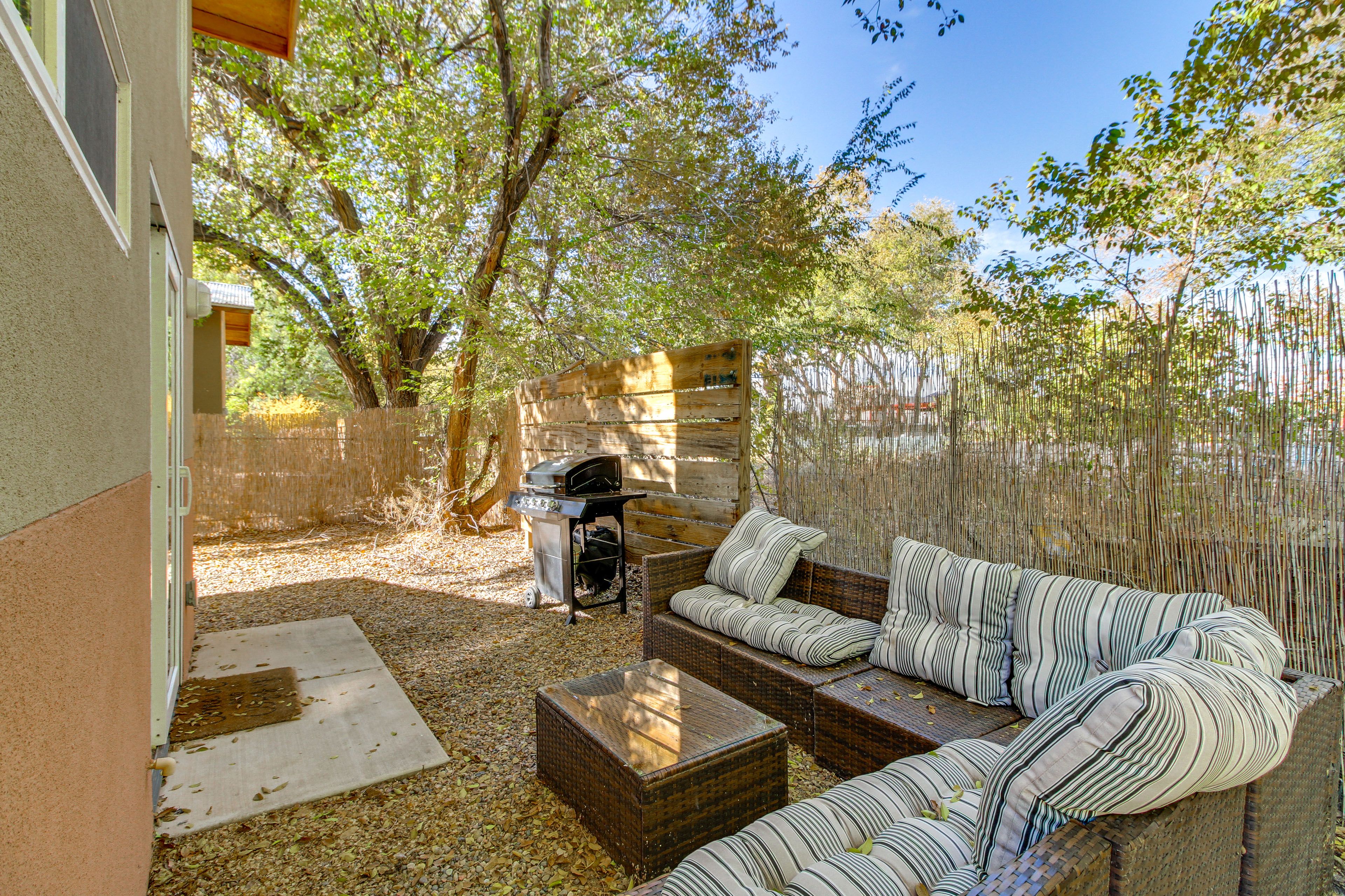 Partially Fenced Yard | Gas Grill | Lounge Seating