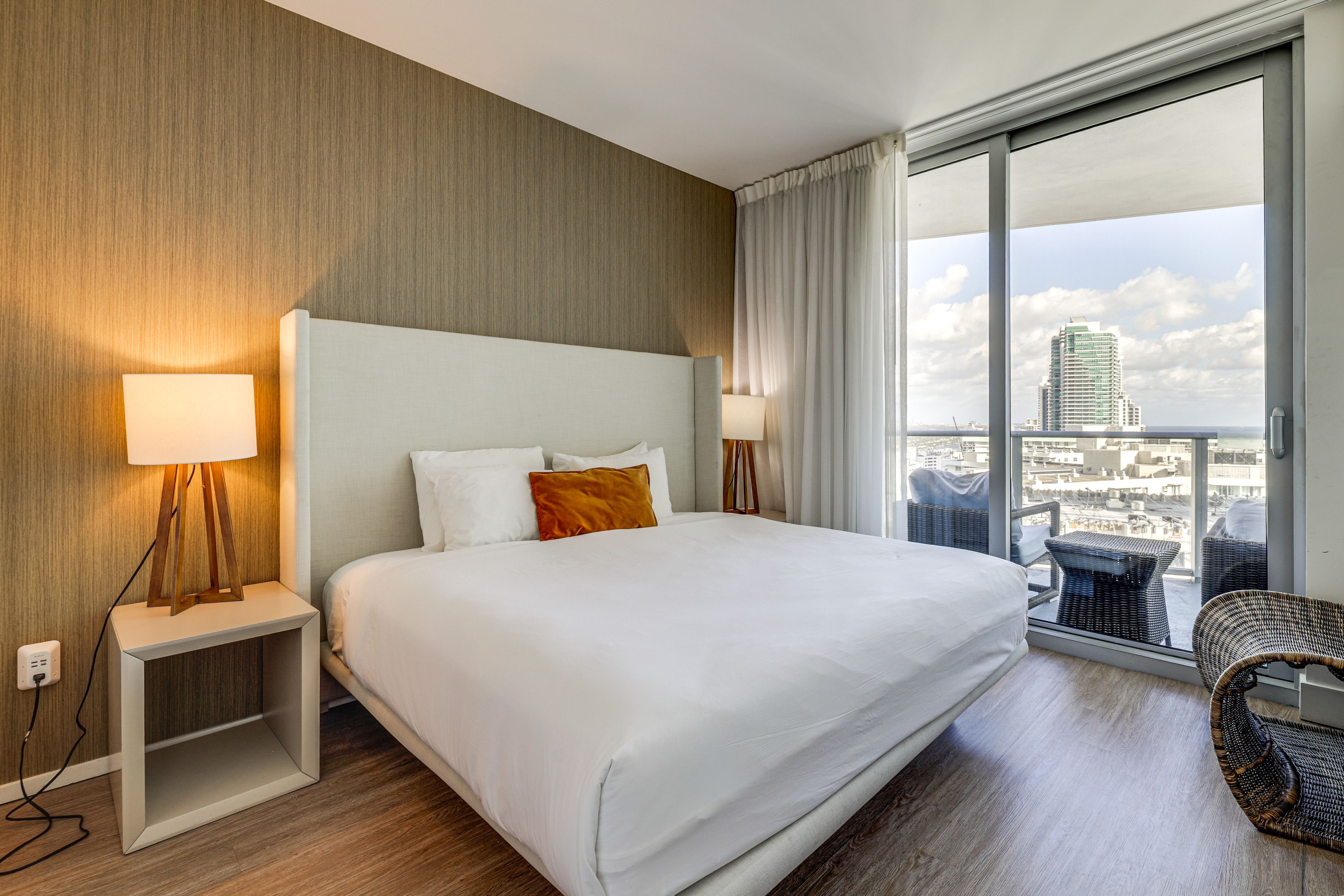 Bedroom 1 | King Bed | Laptop-Friendly Workspace | Balcony Access