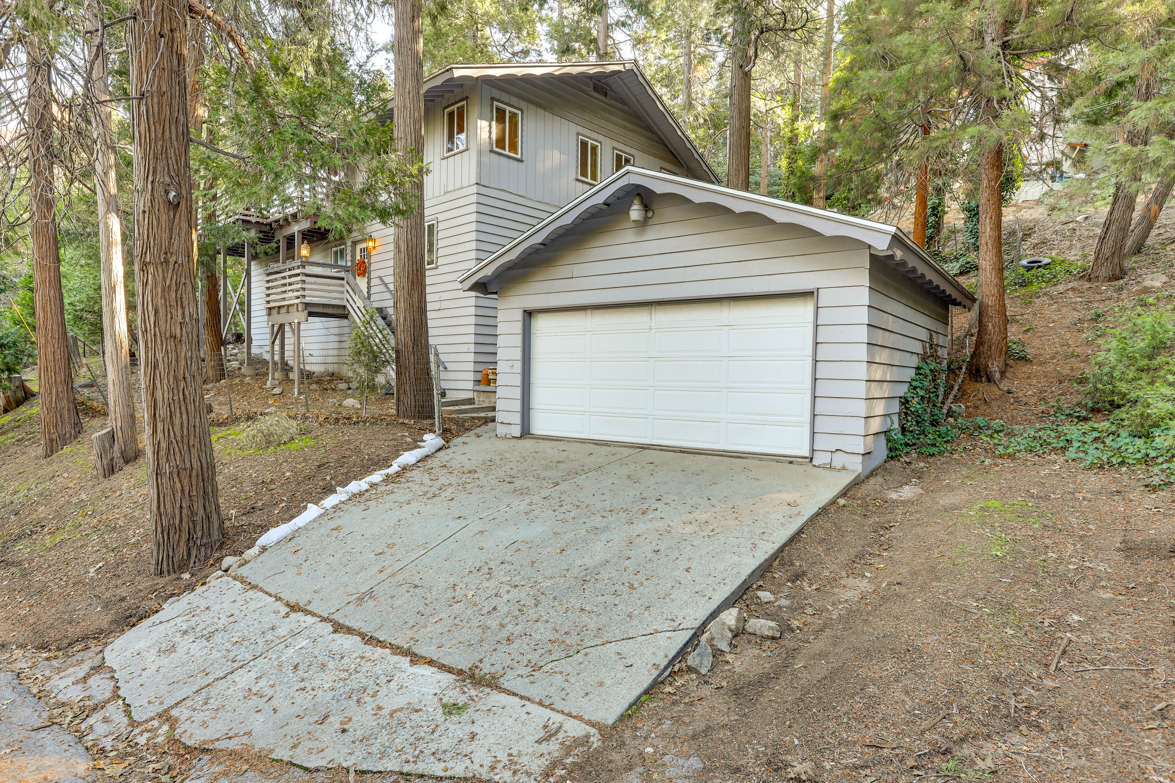 Parking | Garage (2 Vehicles) | Side Parking Area (1 Vehicle)
