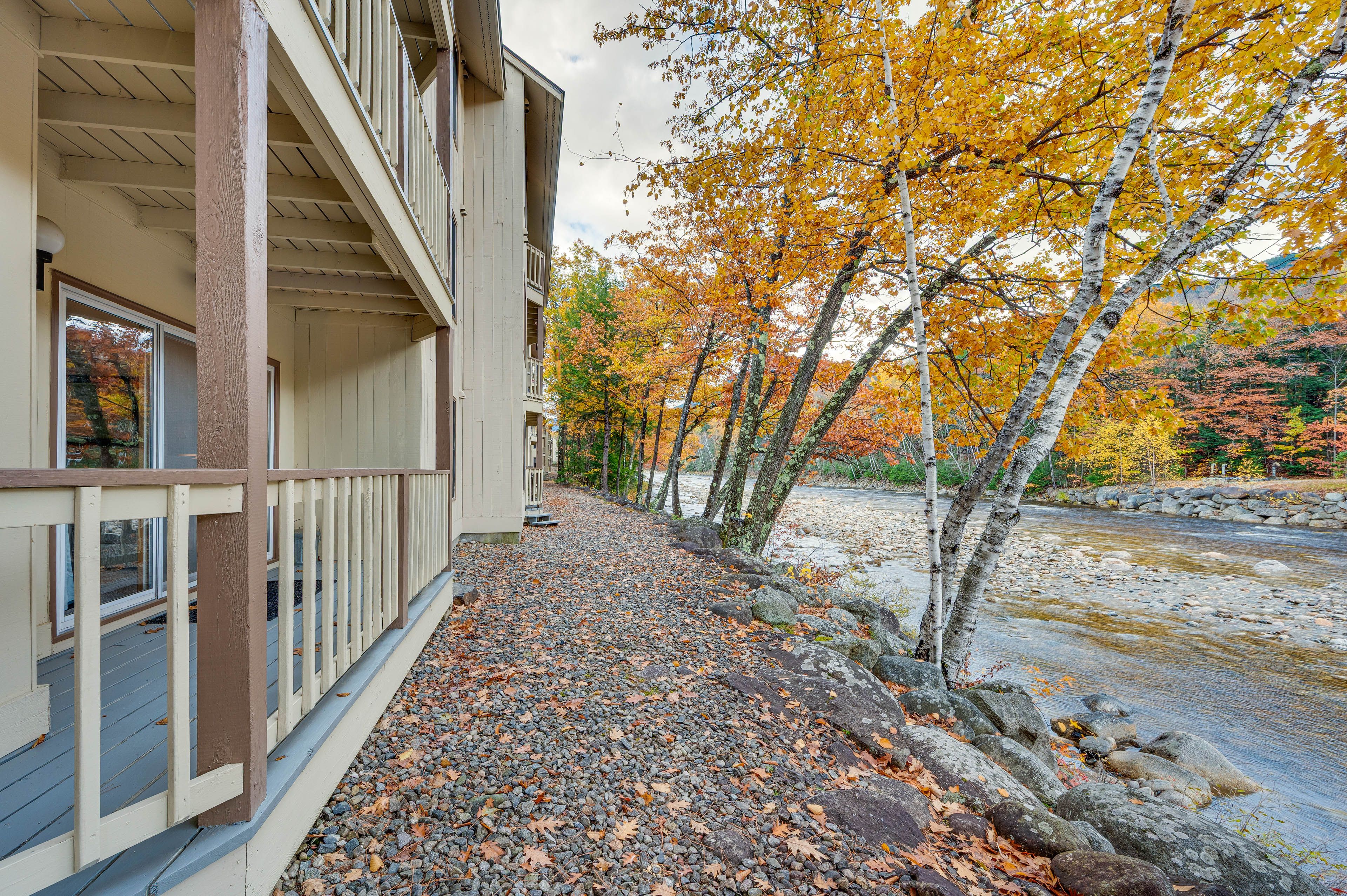 Condo Exterior | Covered Deck | River Views