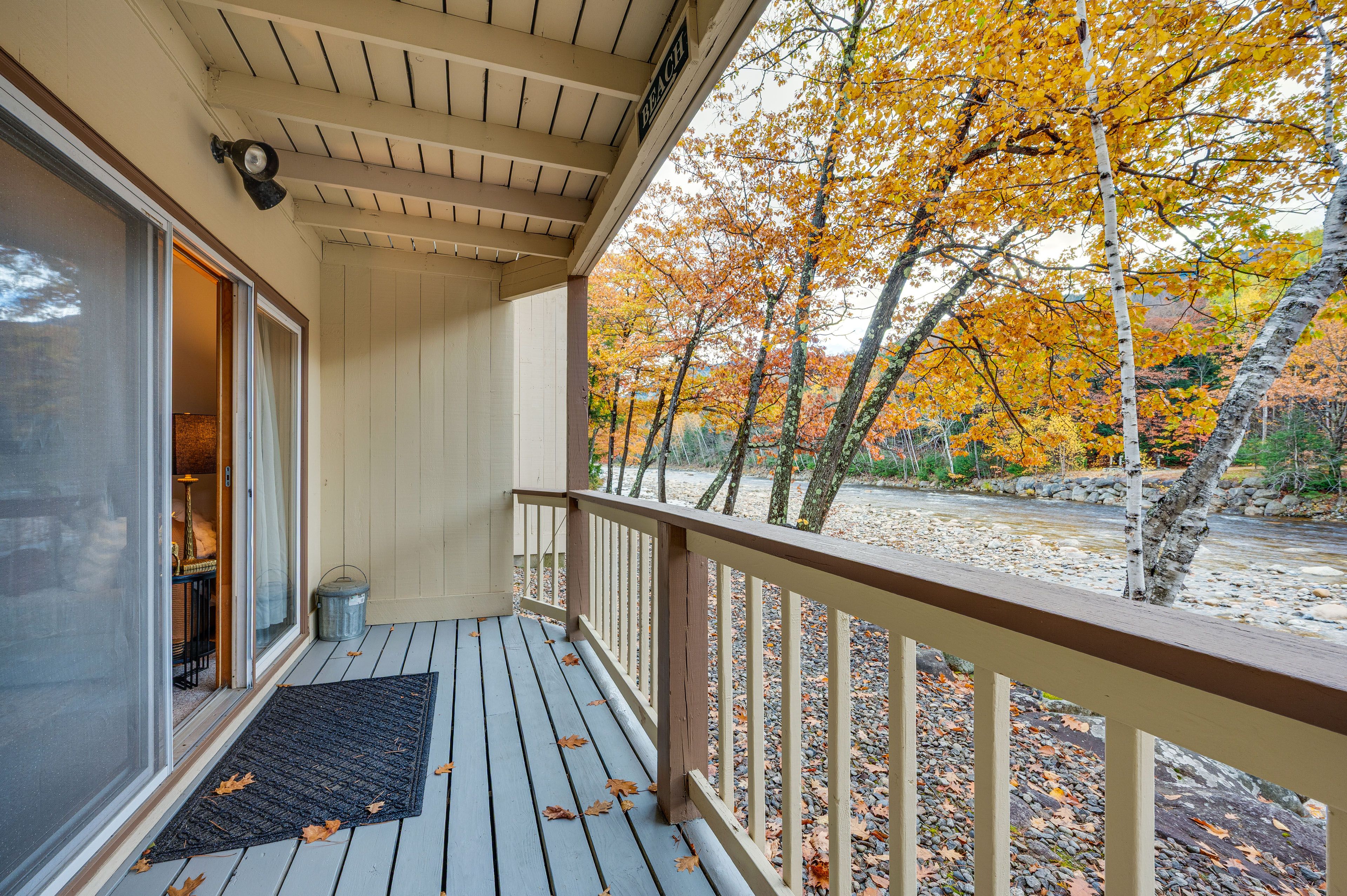 Condo Exterior | Covered Deck | River Views