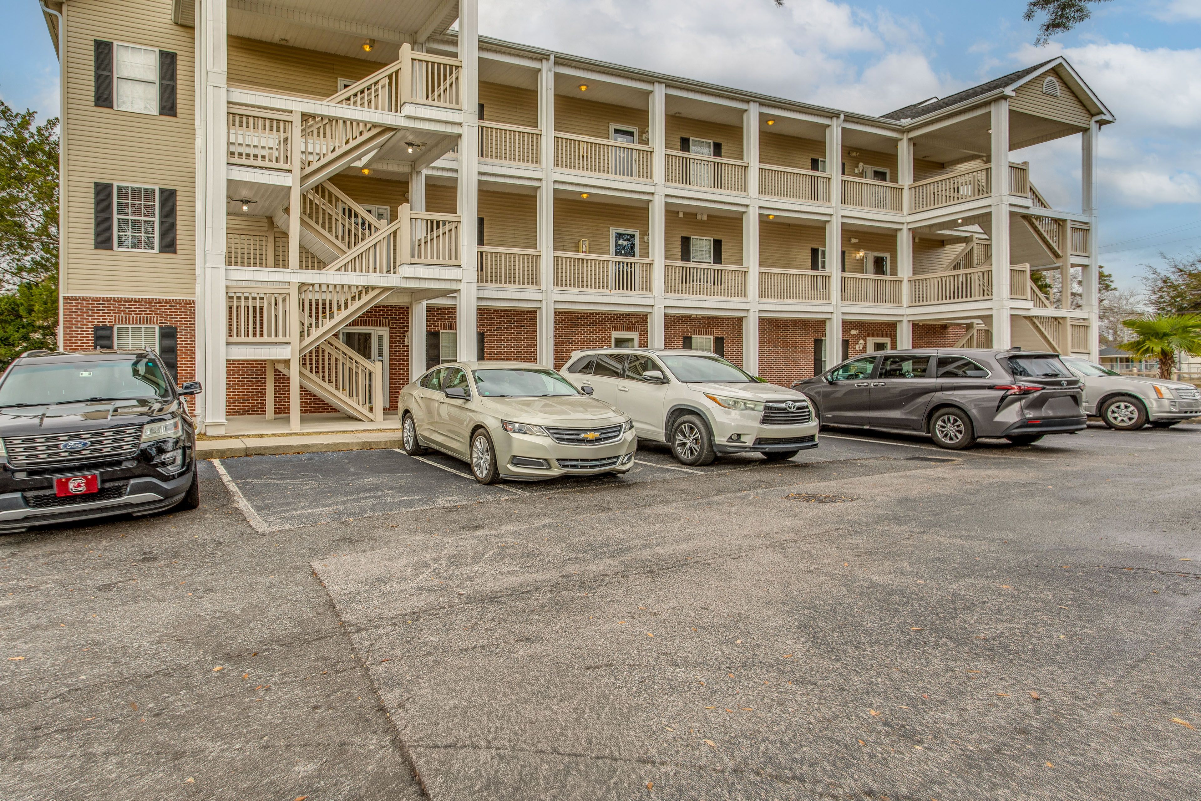 Property Exterior | Community Parking Lot (2 Vehicles)