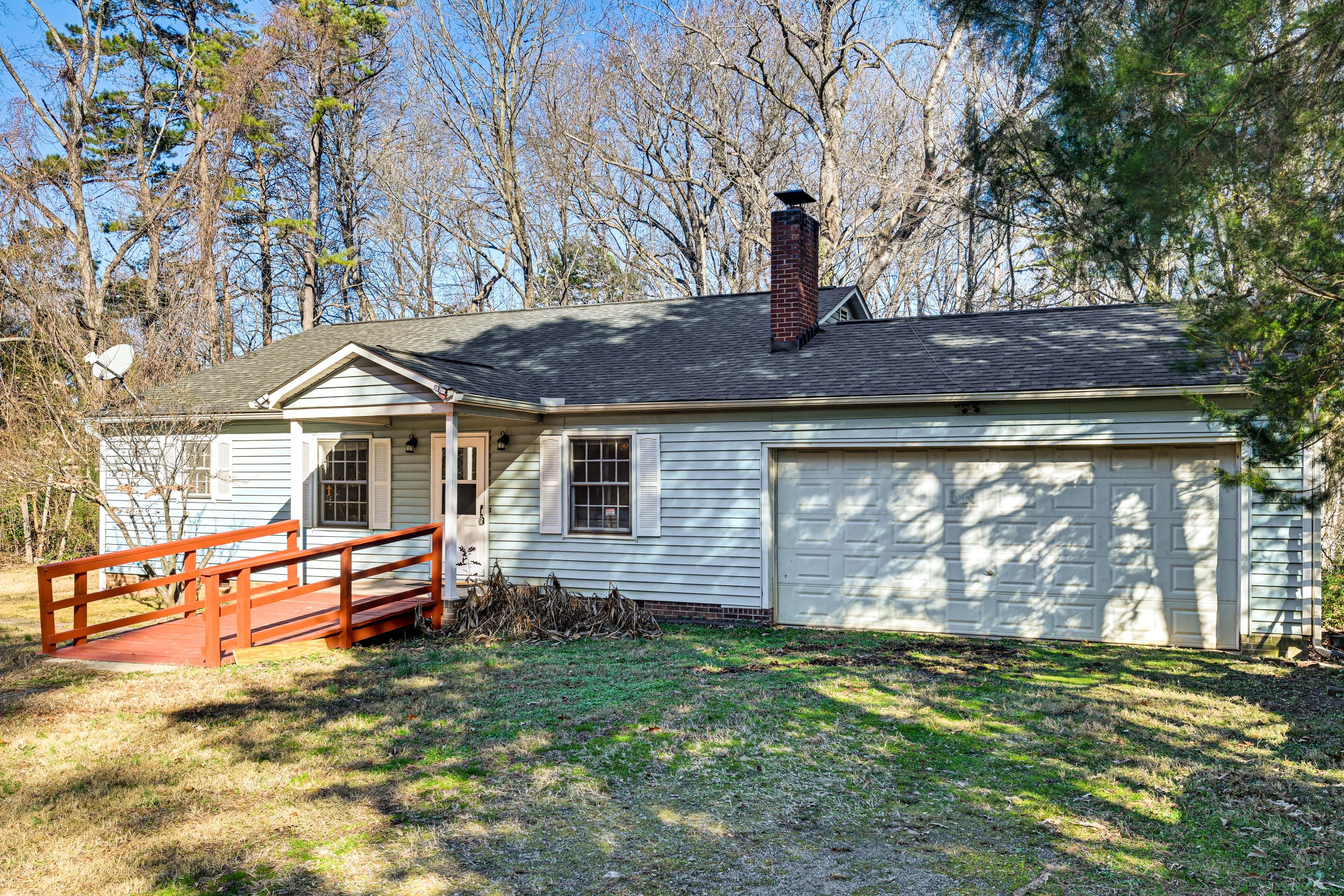 Parking | Gravel Driveway (2 Vehicles) | Garage (1 Vehicle)