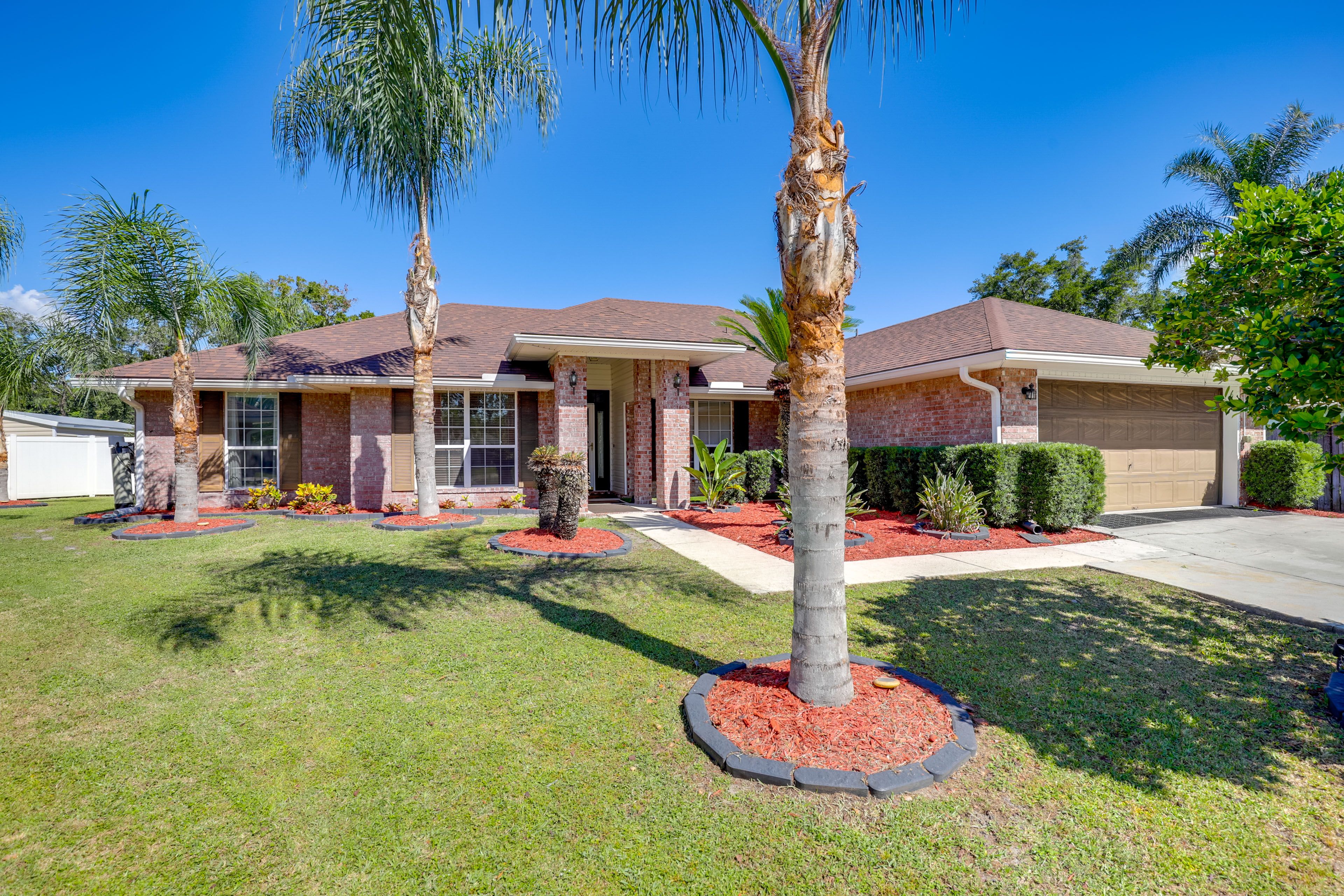 Property Exterior | Fenced-In Yard | Furnished Patio | Gas Grill
