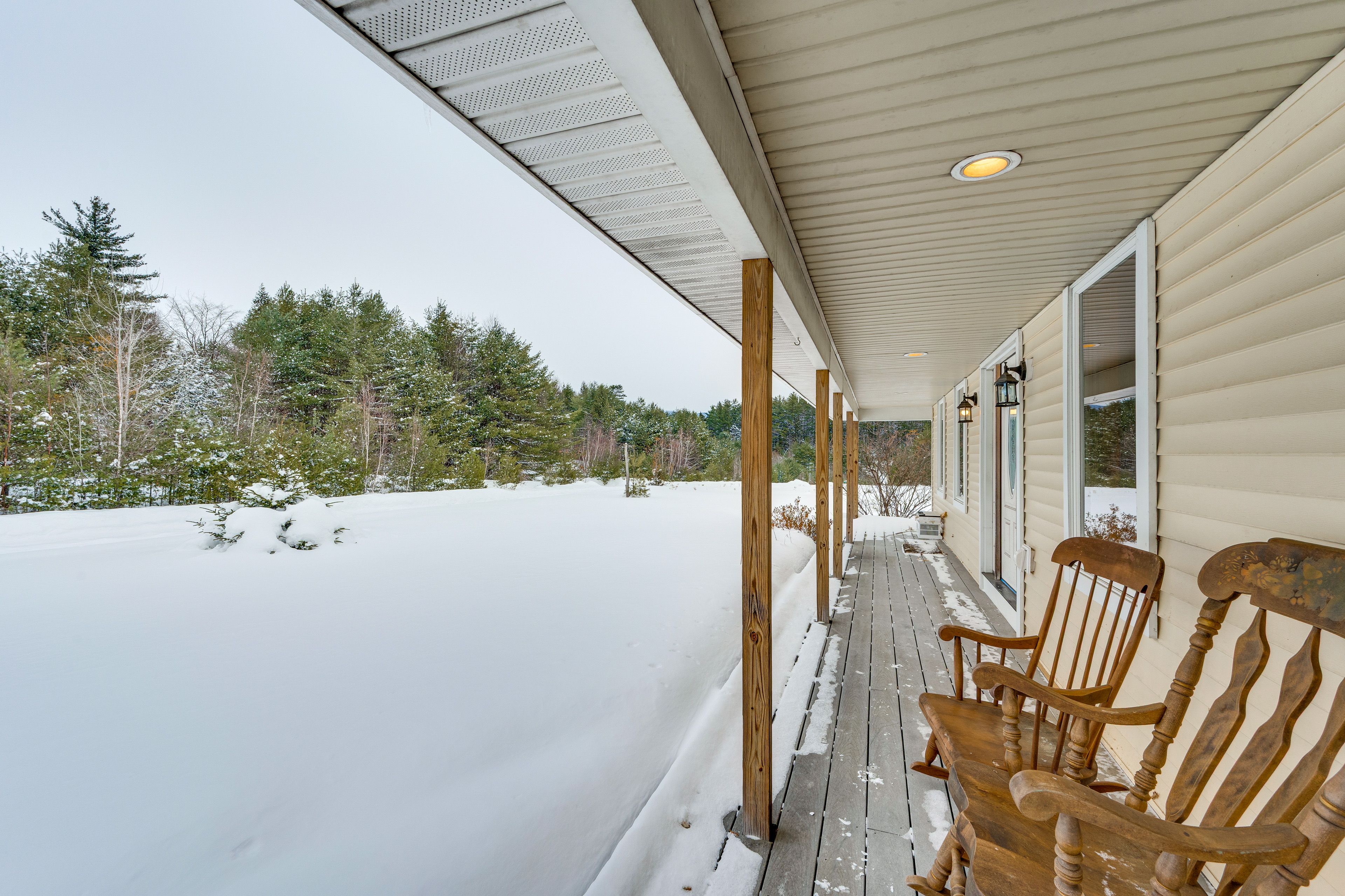Front Porch | Outdoor Seating | Wooded Surroundings