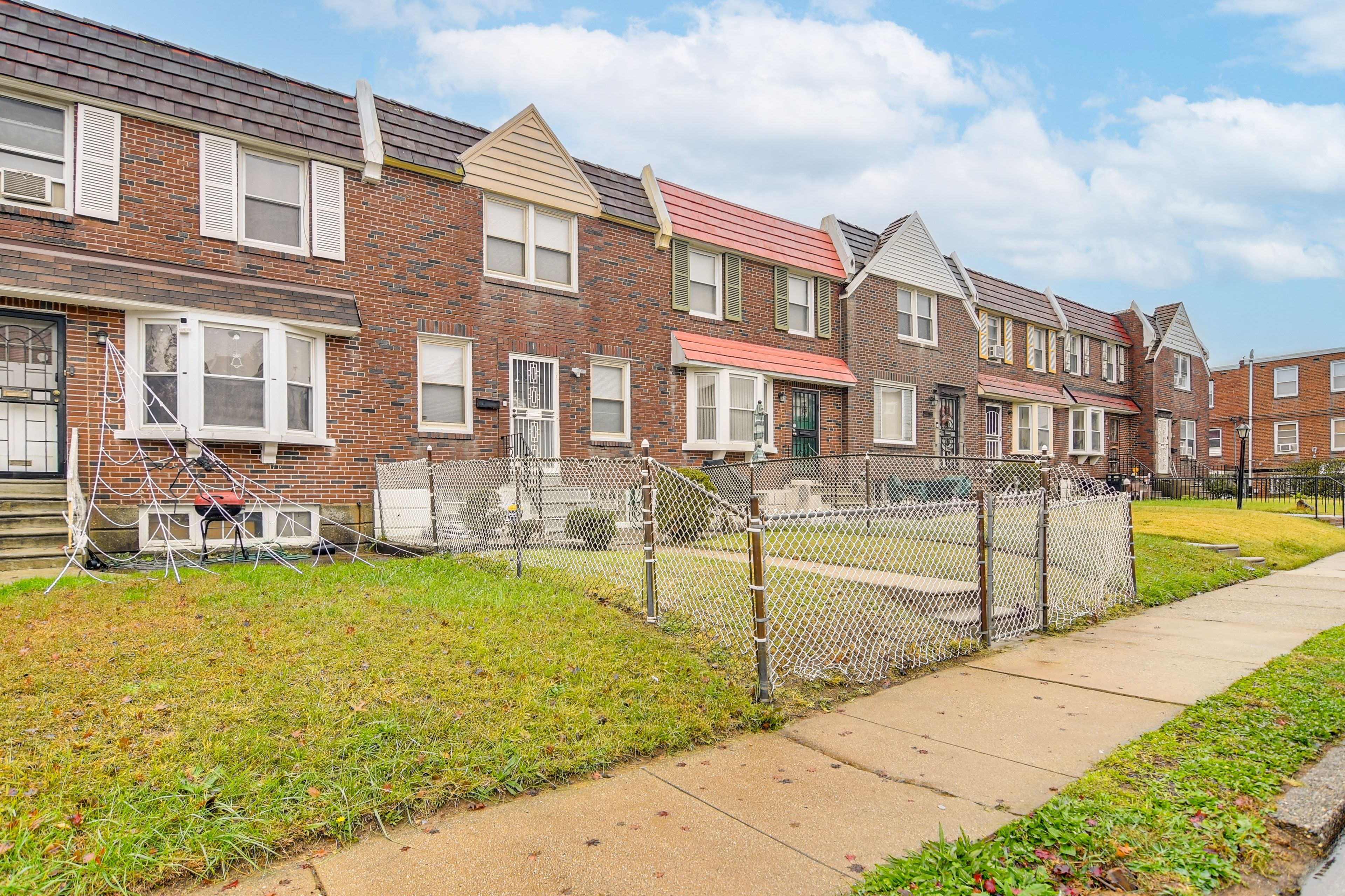 Front Exterior | Fenced Yard | 3-Story Home