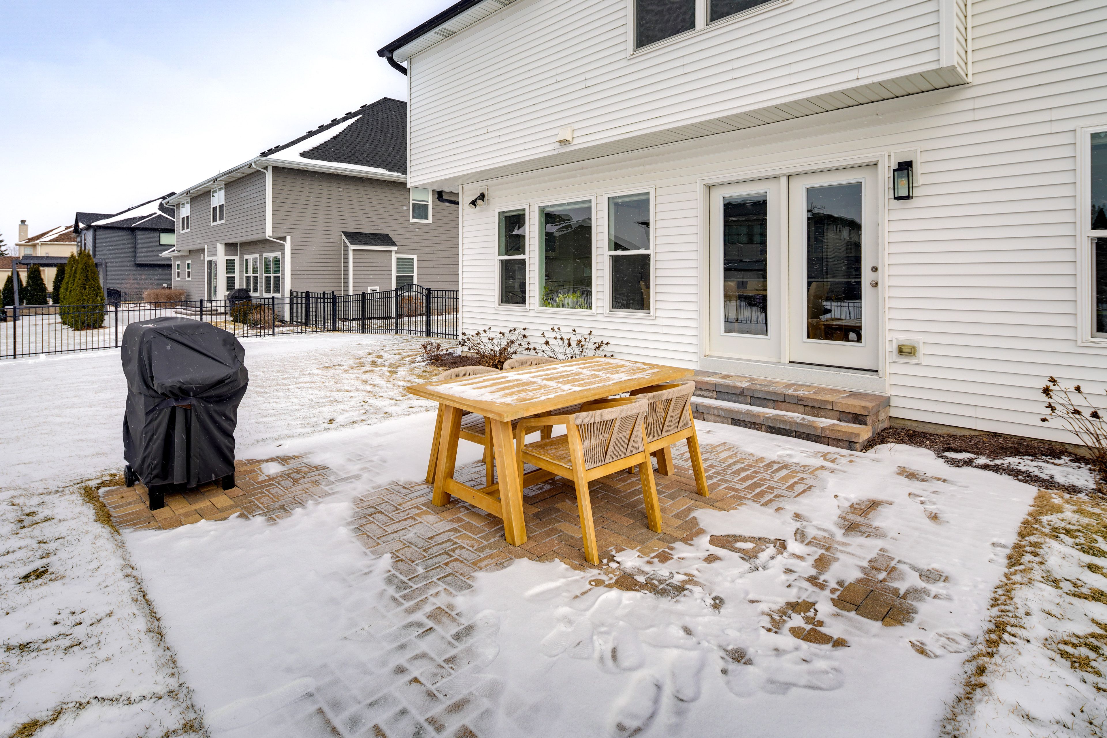 House Exterior | Patio w/ Dining Area | Gas Grill | Fenced Backyard