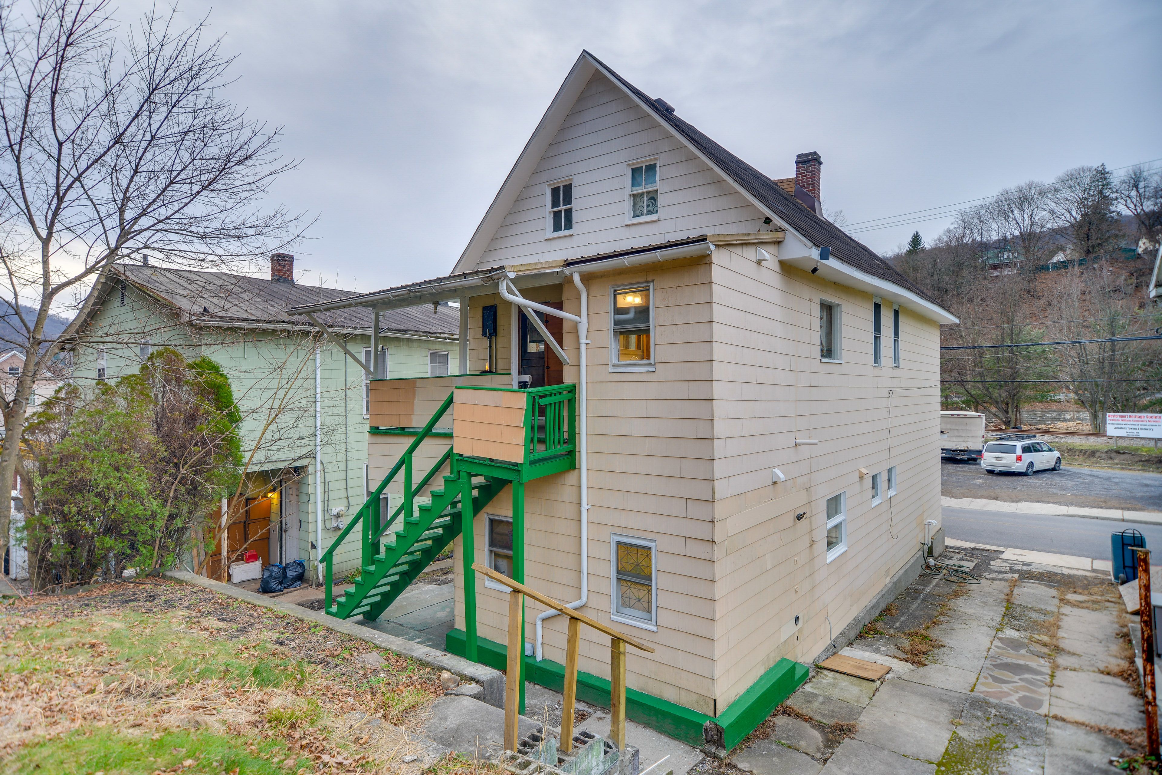 Property Exterior | Shared Balcony w/ Sauna & Tabletop Fire Pit
