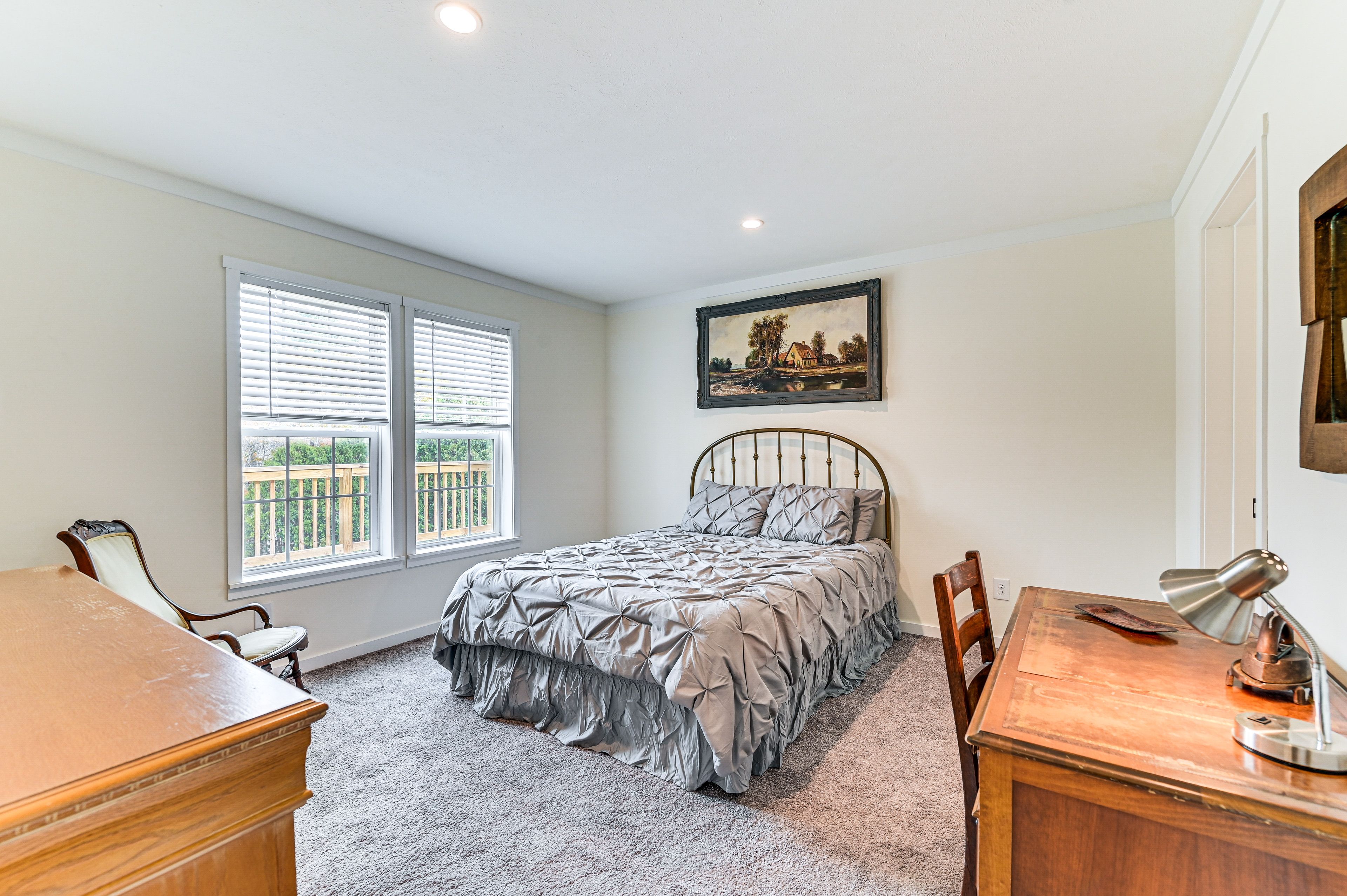 Bedroom 1 | Queen Bed | Laptop-Friendly Workspace | En-Suite Bathroom