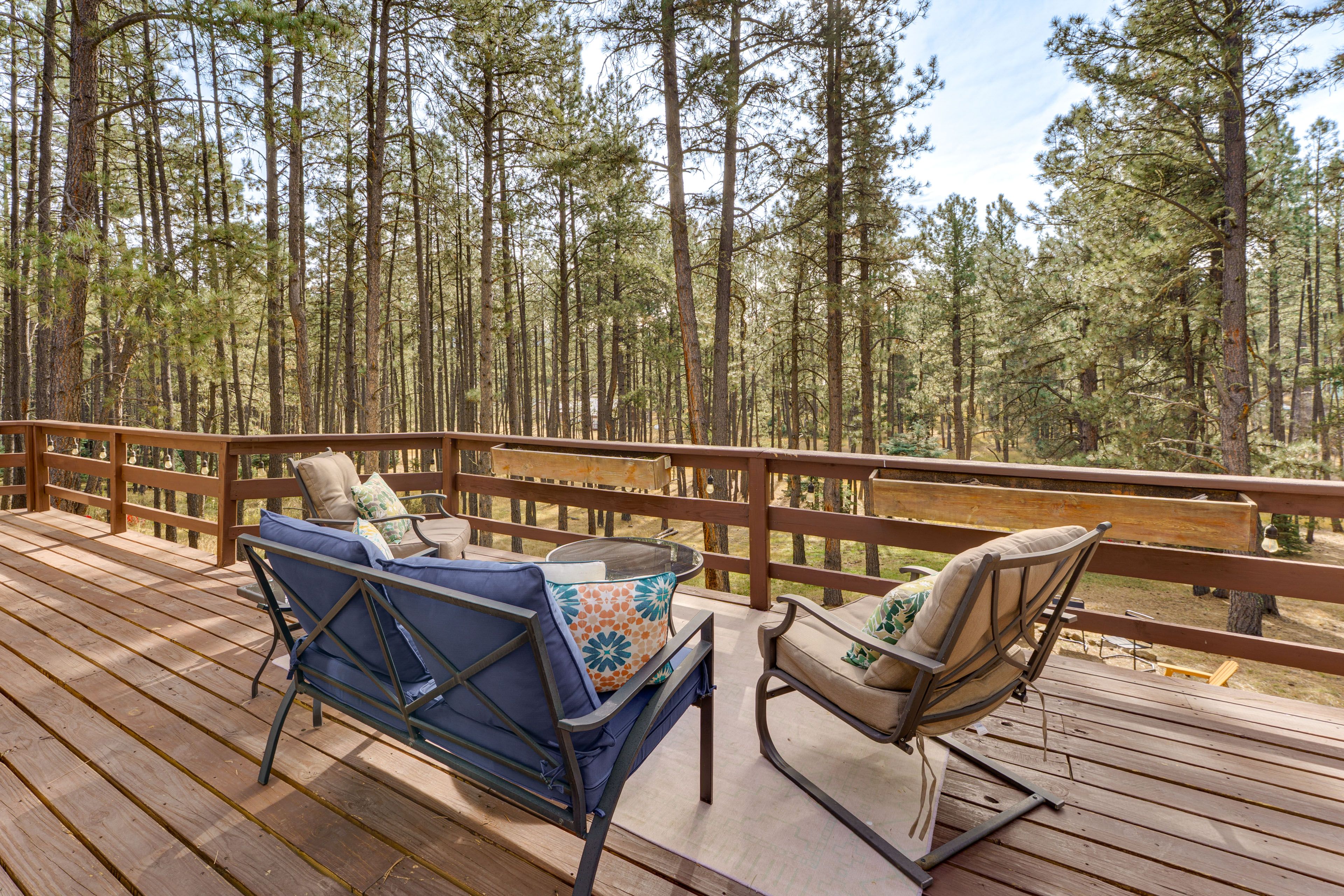 Private Deck | Outdoor Seating | Wooded Location