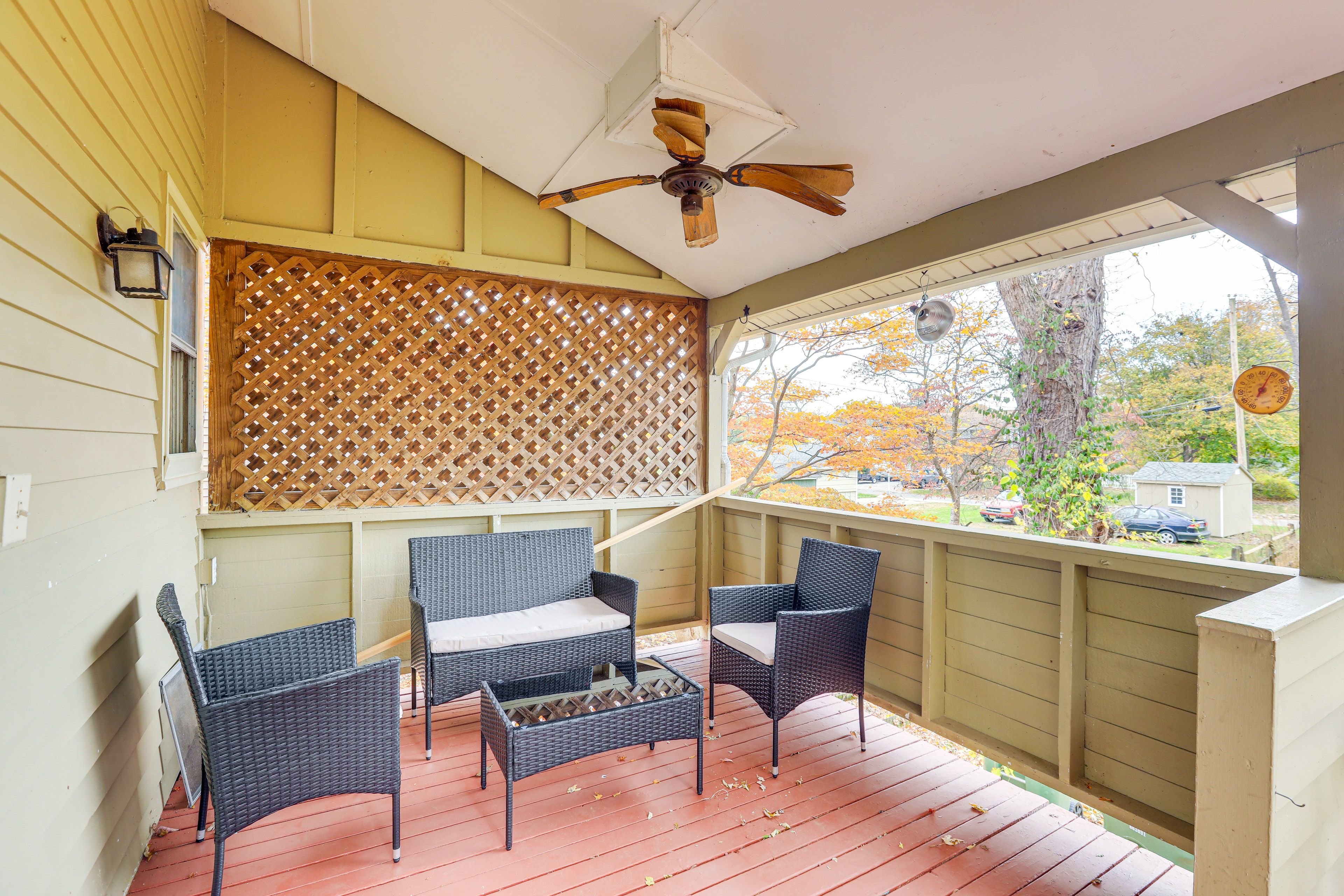 House Exterior | Covered Deck w/ Seating | Gas Grill