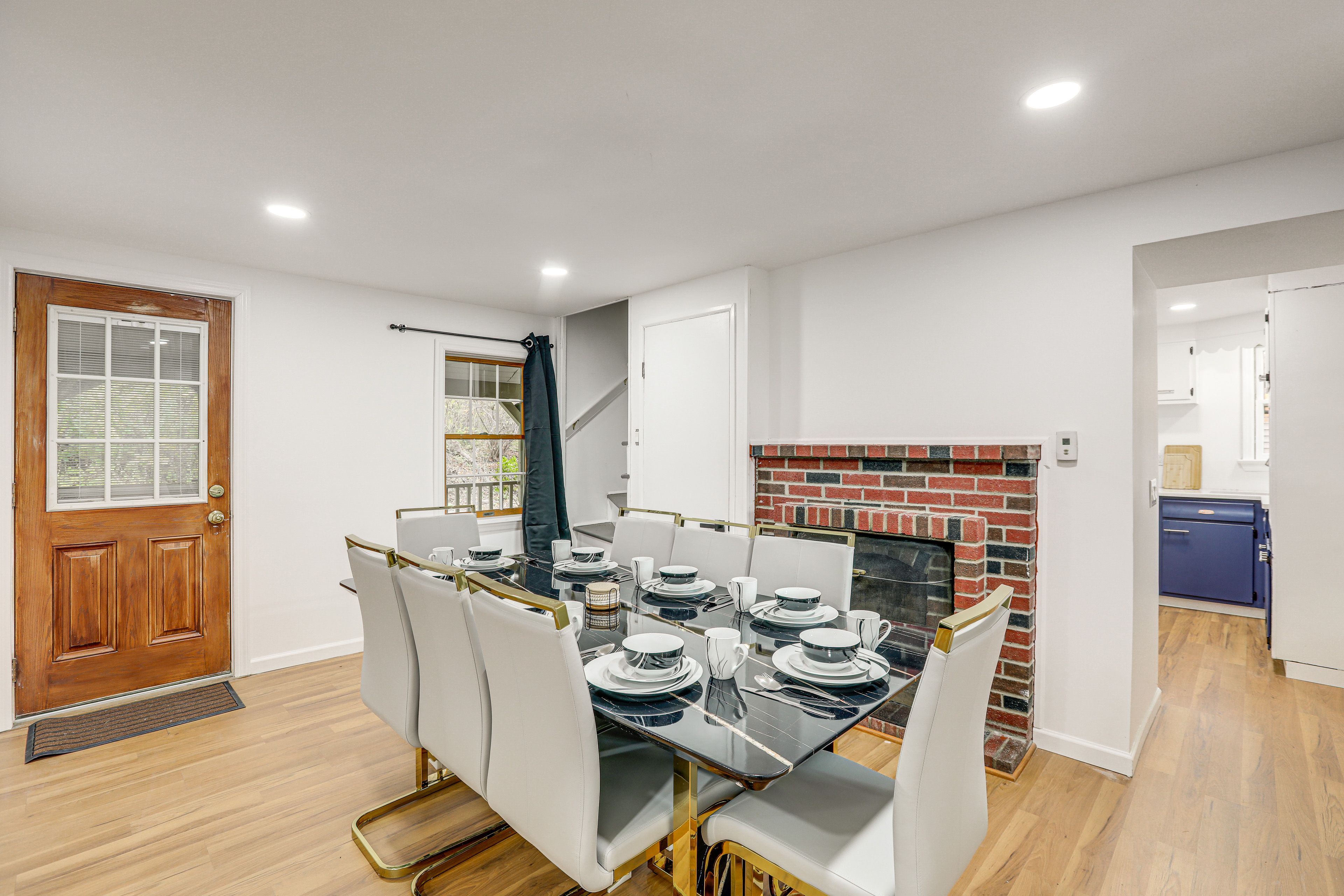 Dining Table | Dishware/Flatware | Decorative Fireplace | 1st Floor