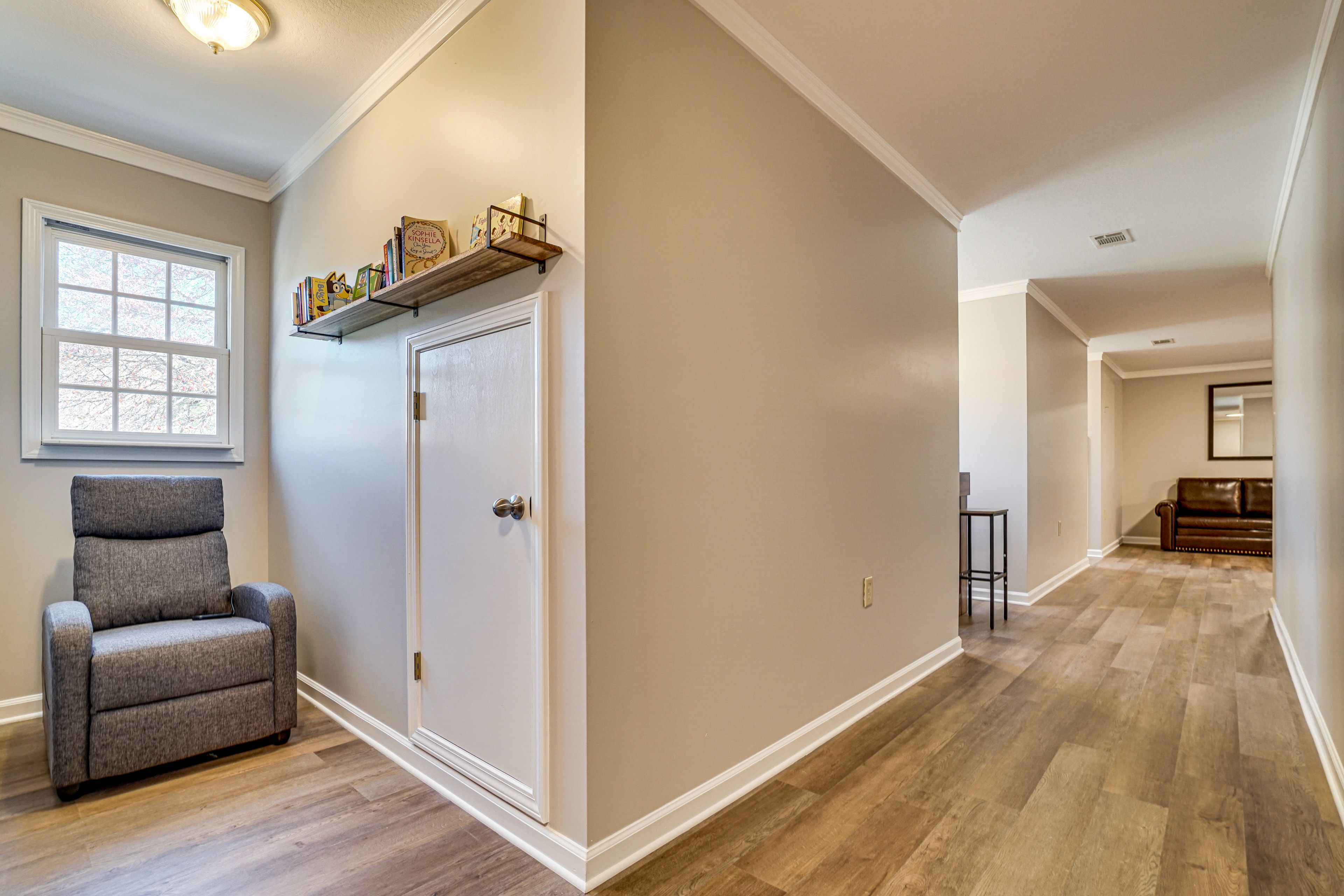 Landing | Sleeper Sofa | Massage Chair | Puzzle Table | Books | Upper Floor