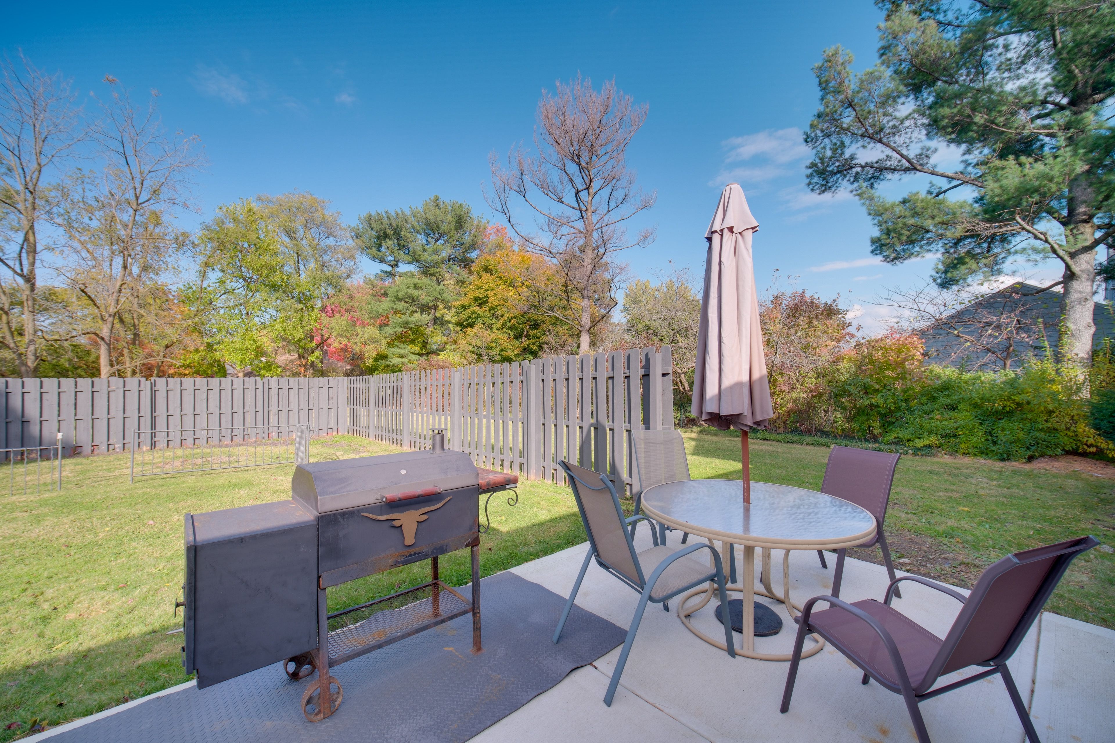 Patio | Outdoor Dining Area | Grill | Fenced-In Yard